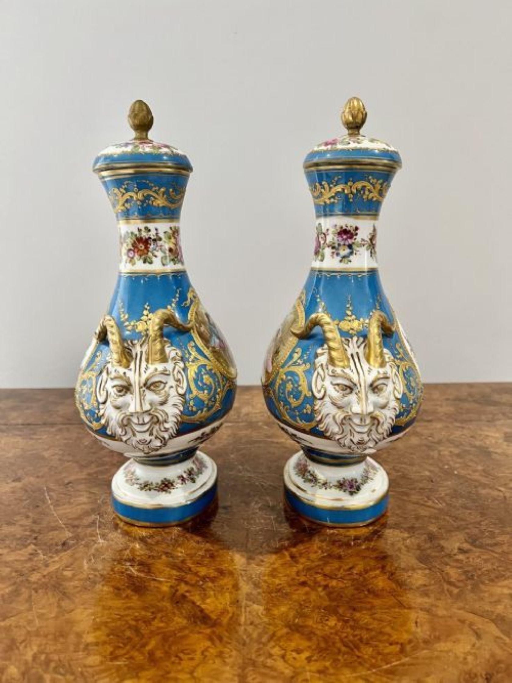 Fine quality pair of antique Victorian French severs lidded vases having fine quality hand painted oval panels with figures, flowers and landscaper's with ram head handles, original lids in wonderful blue, green, brown, red, yellow and white colours