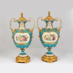 Fine Quality Pair of Elegant Gilt Bronze Mounted Sèvres Porcelain Urns