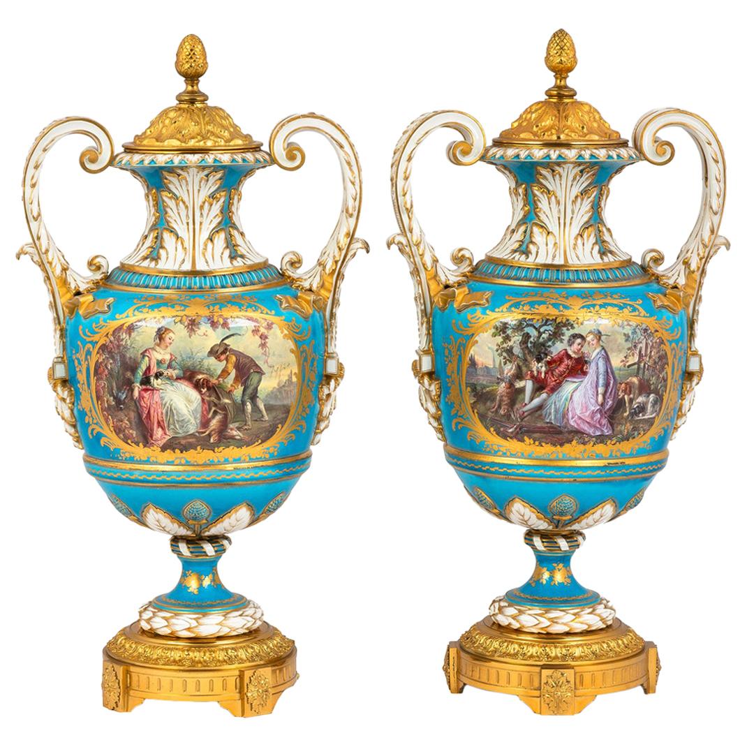 Fine Quality Pair of Elegant Gilt Bronze Mounted Sèvres Porcelain Urns