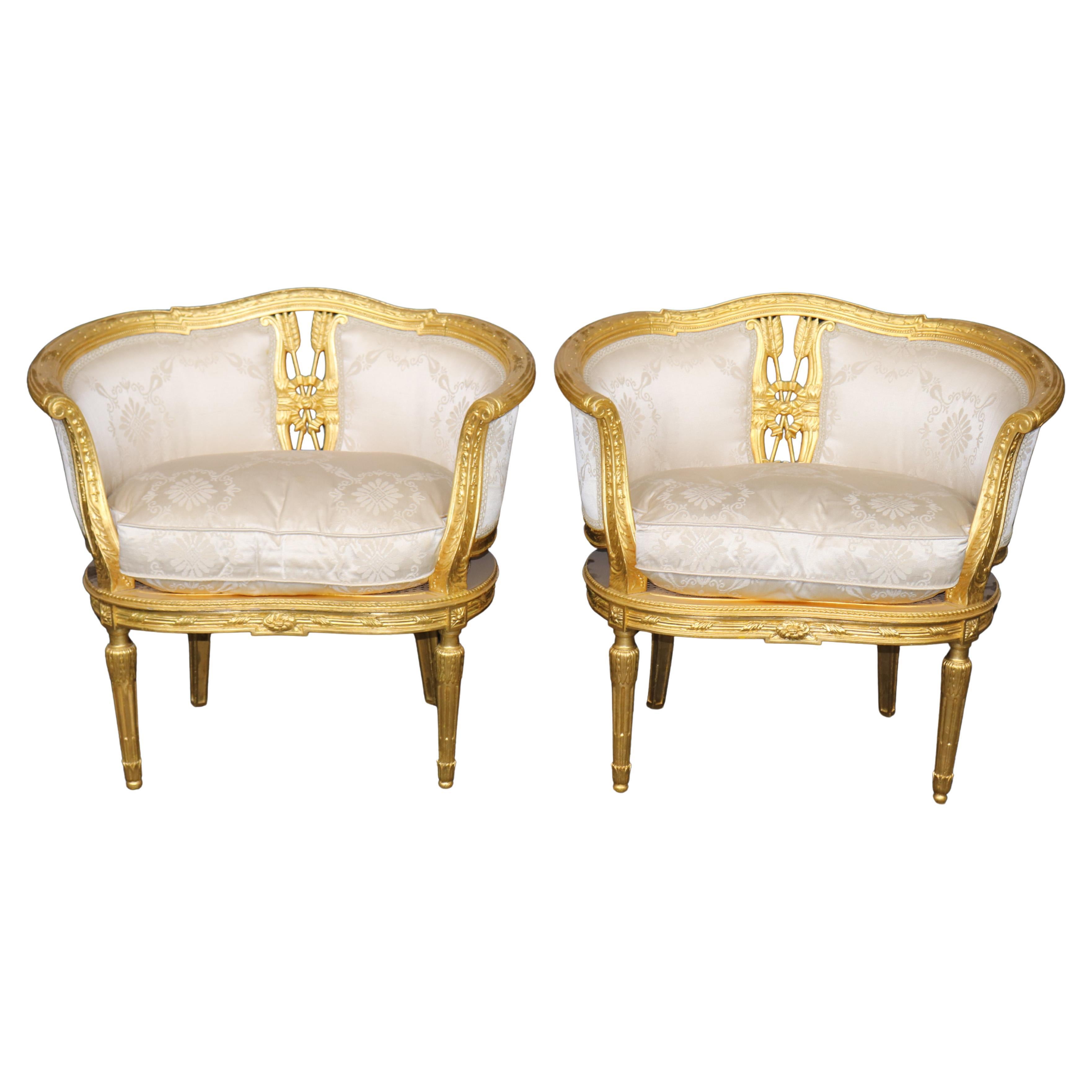 Paire de chaises "Bergere" en bois doré de la Belle Epoque avec Cross Arrows en vente