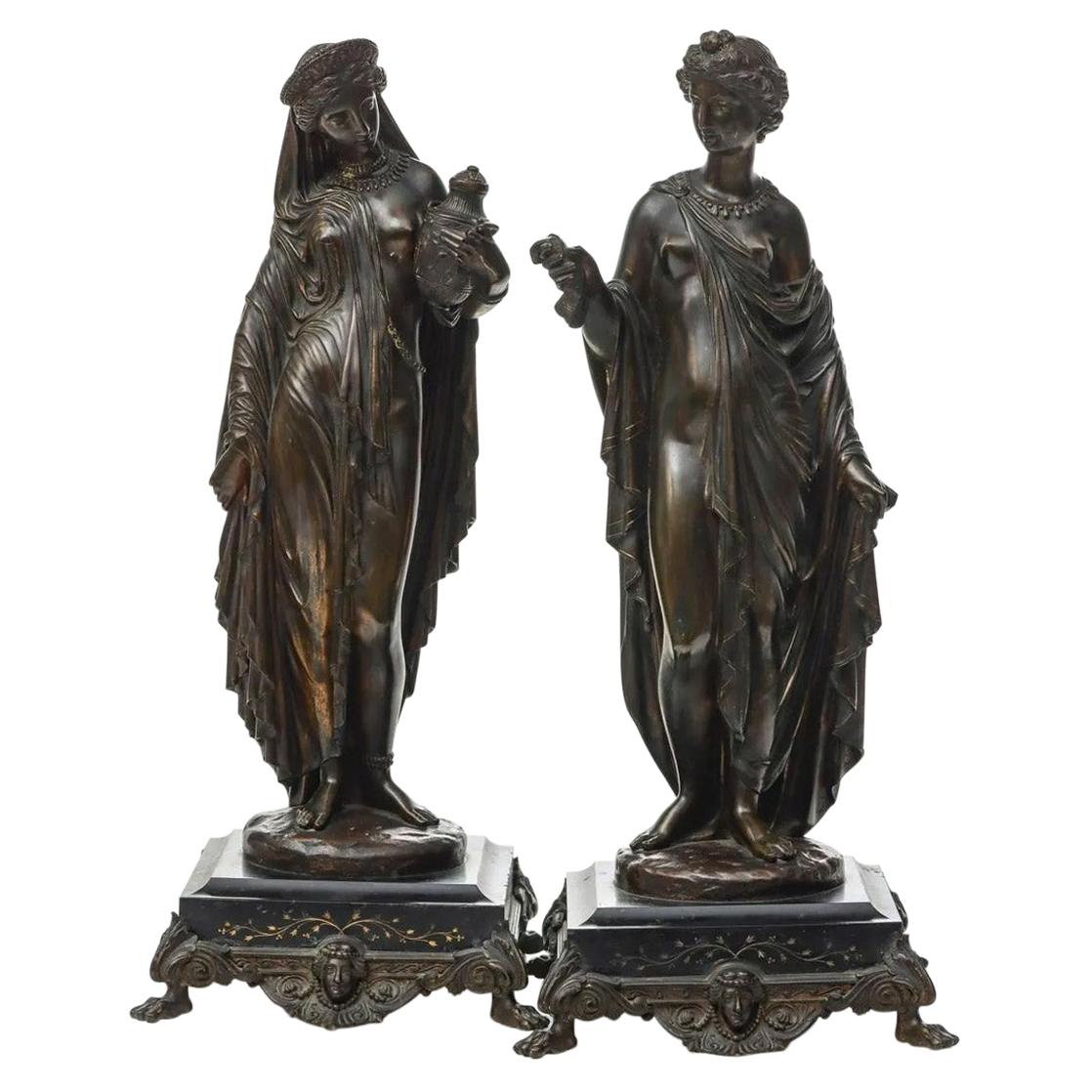 Paar neoklassizistische Skulpturen aus patinierter Bronze von hoher Qualität