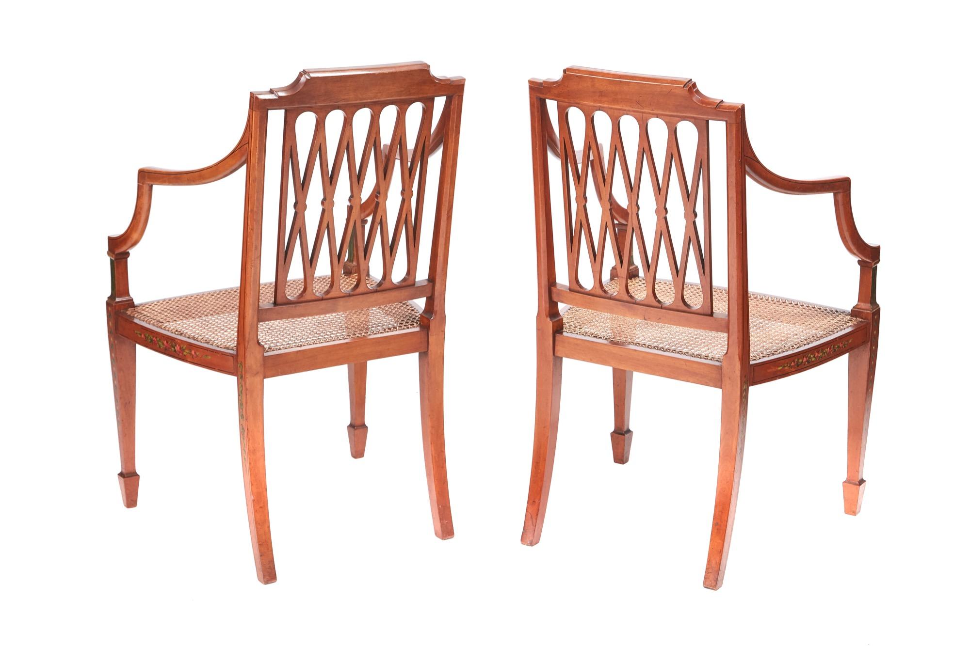 Fine quality pair of original painted satinwood arm chairs, with lovely original painted decoration all over each chair, lovely shaped open arms, standing on square tapering legs with spade feet to the front outswept back legs.
Fantastic color and