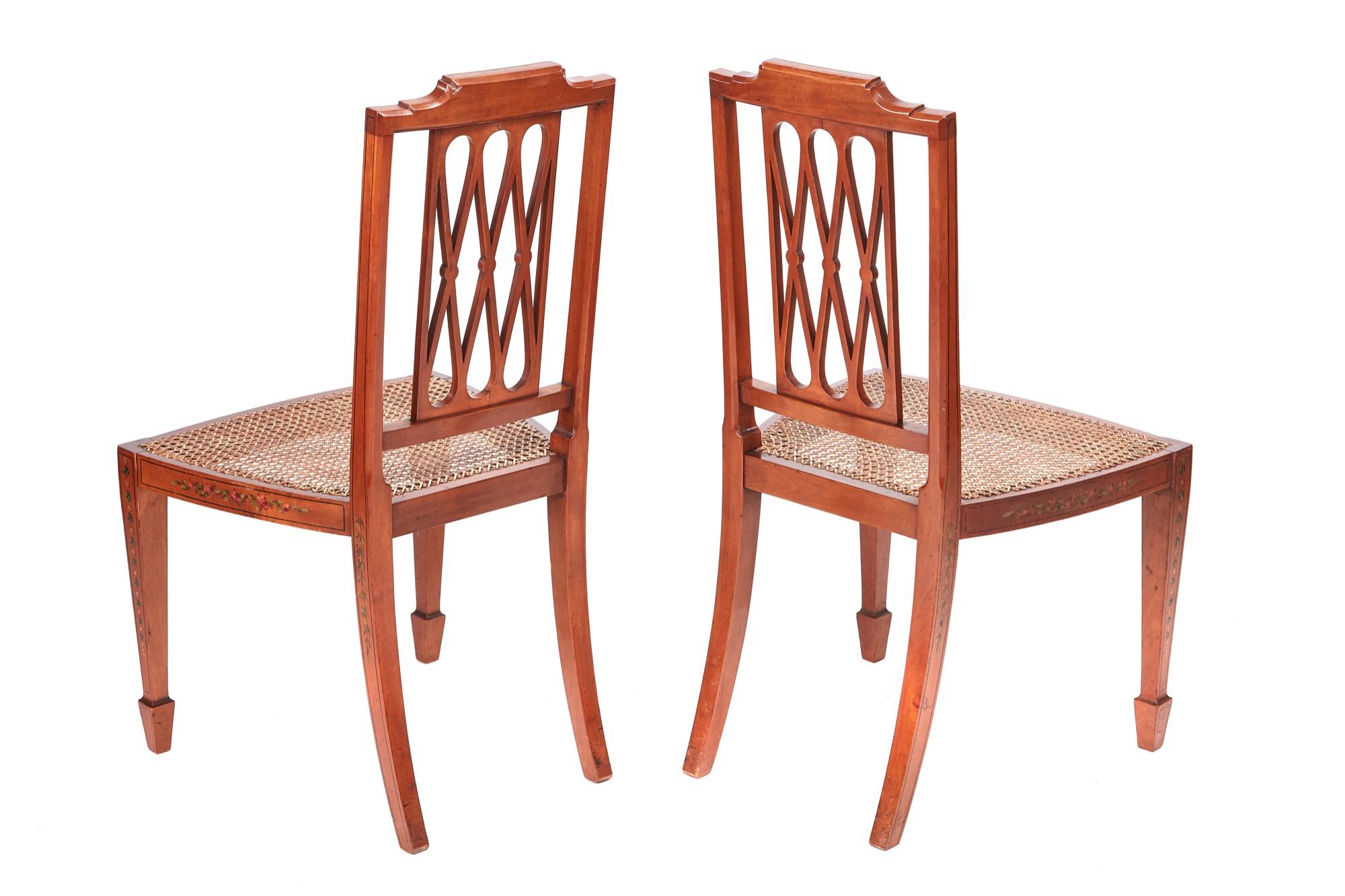 Fair quality pair of original painted satinwood side chairs, with lovely painted decoration all-over each chair, standing on square tapering legs to the front with spade feet, outswept back legs
Fantastic color and condition.
Measures: 19