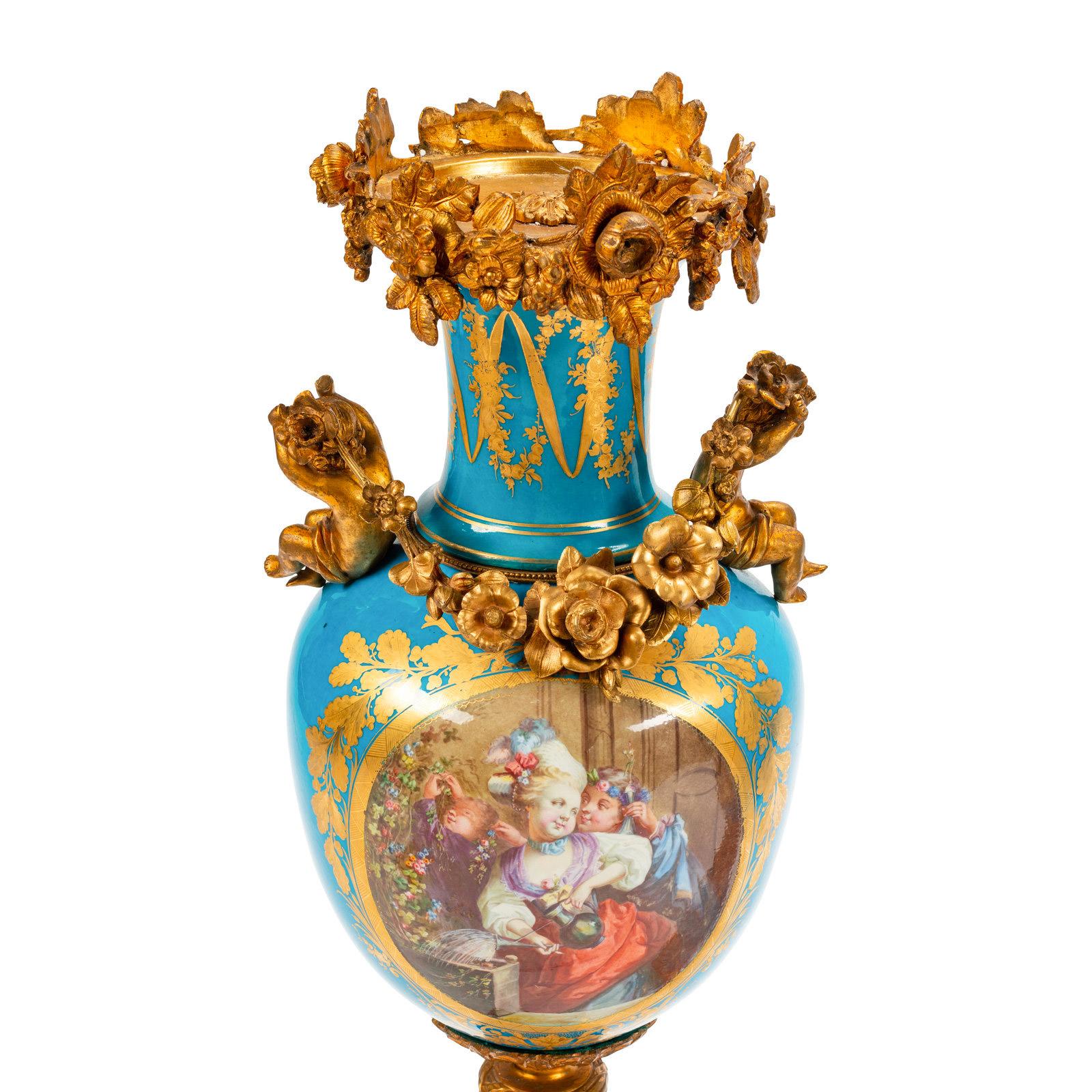 French Fine Quality Pair of Sèvres Style Ormolu-Mounted Porcelain Urns with Cherubs For Sale