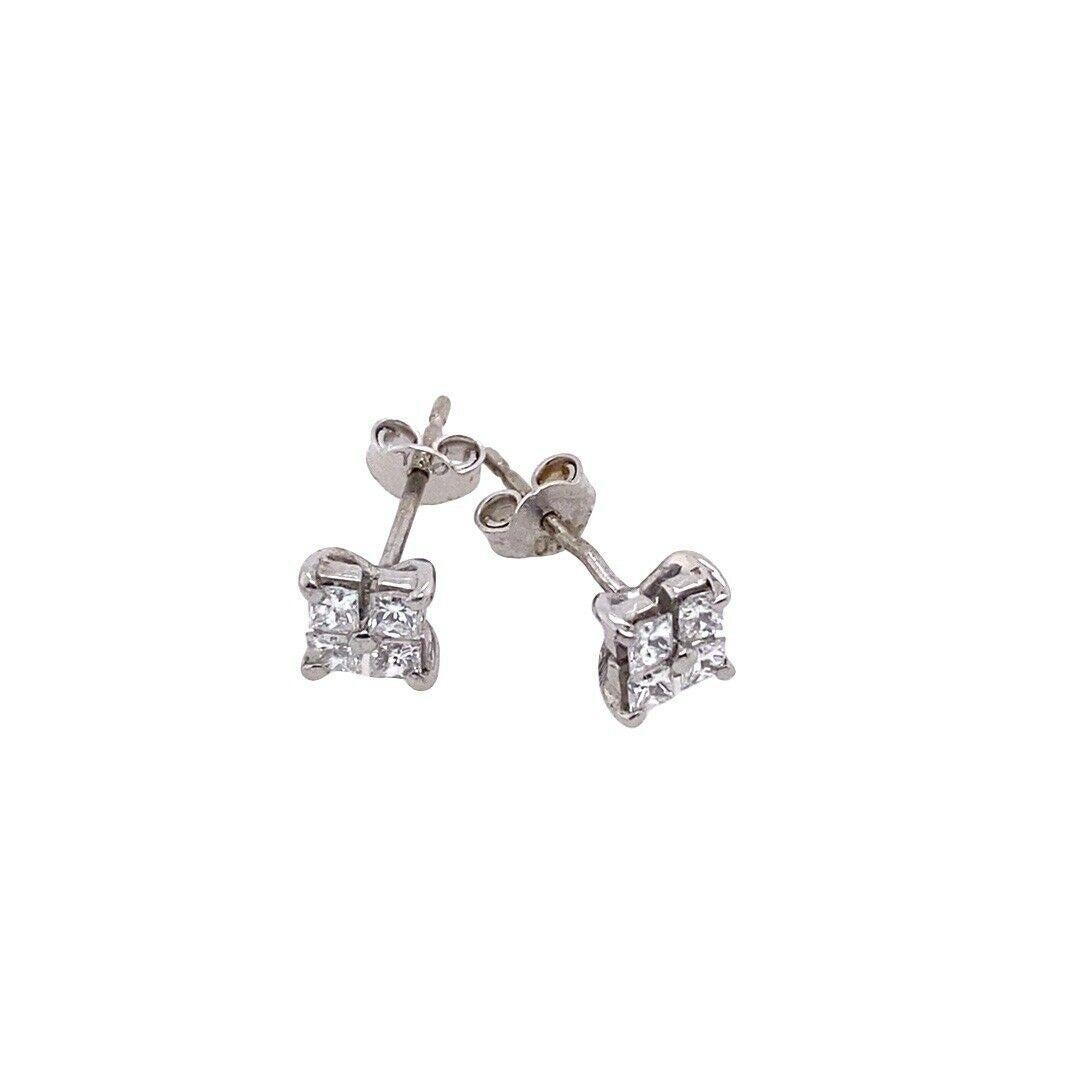 Fine Quality Princess Cut Diamond Earrings in 18ct White Gold

This pair of earrings is a delicate arrangementof 4 princess cut diamonds in a flower design.The earrings are crafted in 18ct white goldand set with 0.45ct of F/VS diamonds.

Additional