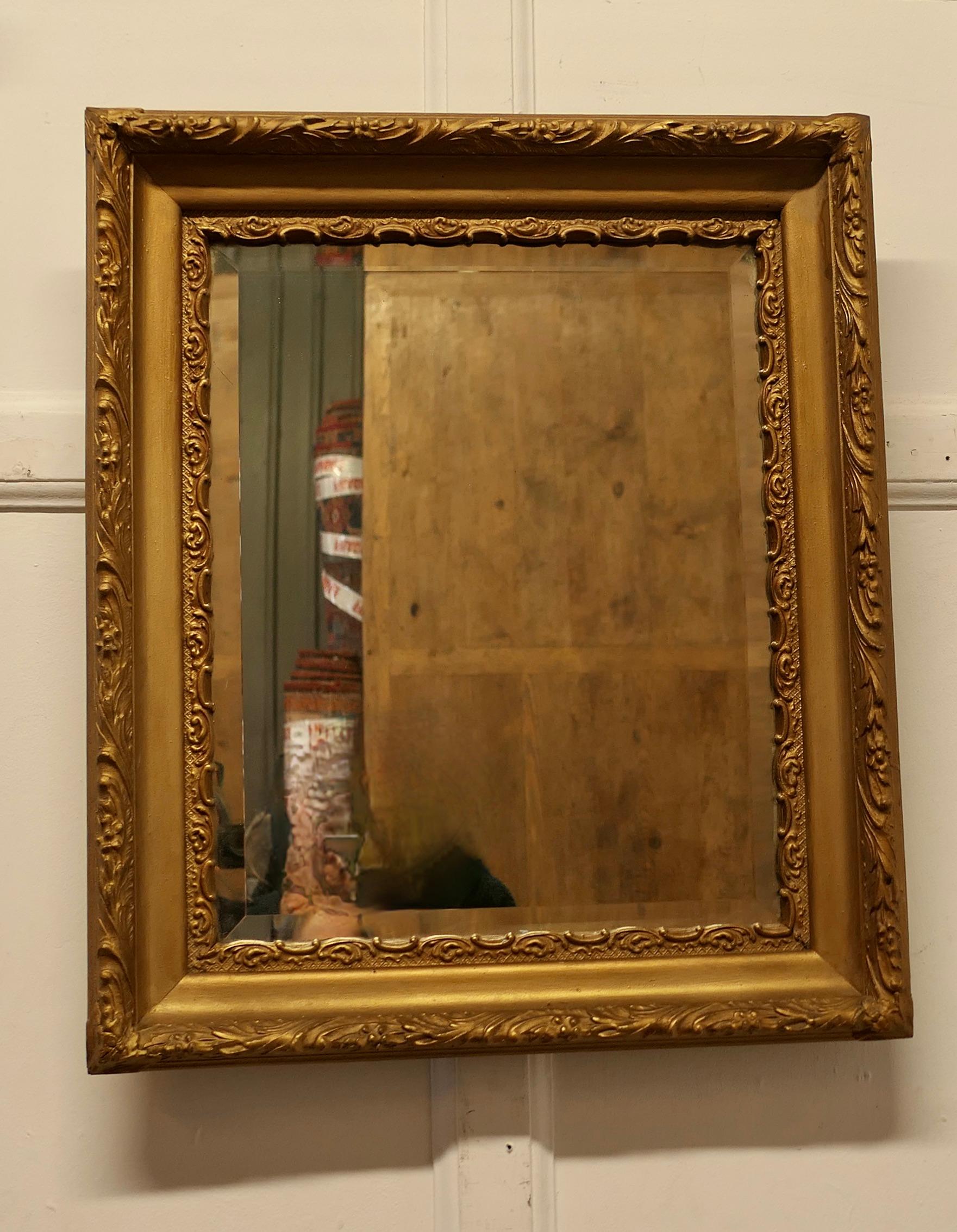 Fine Quality Rectangular Gilt Wall Mirror

The mirror is in a 3.5” wide beautifully decorated Gilt Frame, it is a good size and has a wide bevelled glass
Both the glass and the frame are in good antique condition  
The overall size  is 26” high x