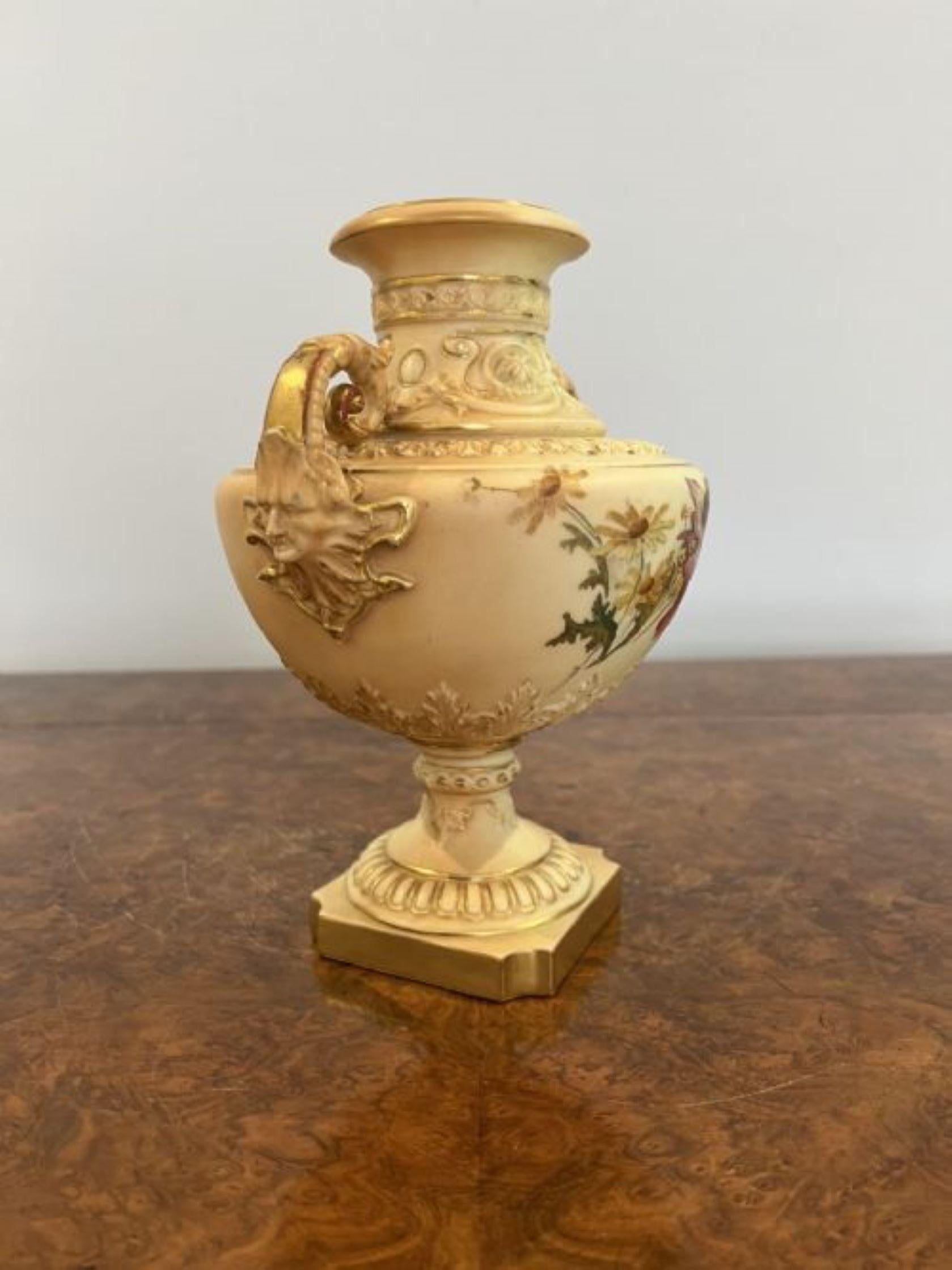 Fine quality Royal Worcester vase having a quality Royal Worcester shaped vase finely painted with flowers in wonderful red, purple, yellow and green colours having two shaped handles to both sides. 