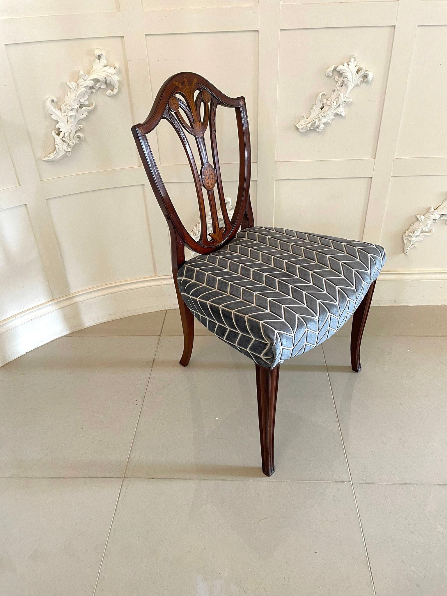 Fine quality set of six antique Victorian mahogany inlaid dining chairs having a fine quality mahogany inlaid back with a shaped top, fantastic pierced carved satinwood inlaid centre splat, newly reupholstered seats in a quality fabric and standing
