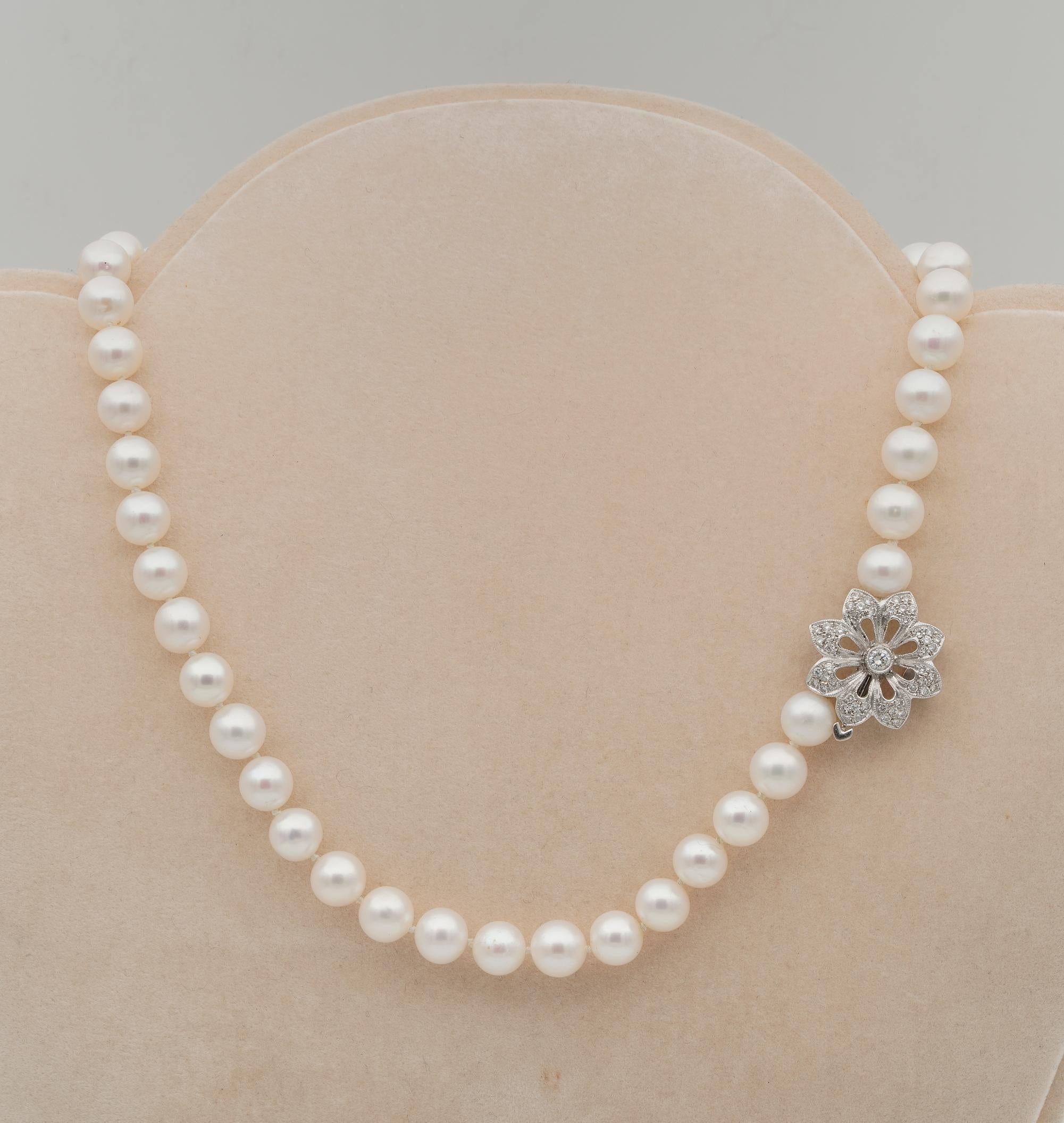 Icon of Classy Style

Fine quality  8 mm diameter Japanese Pearl strand complemented by a beautiful large >diamond flower which can be worn on side or at centre point
Vintage necklace 1960/70 in age, very well preserved and treasured along the