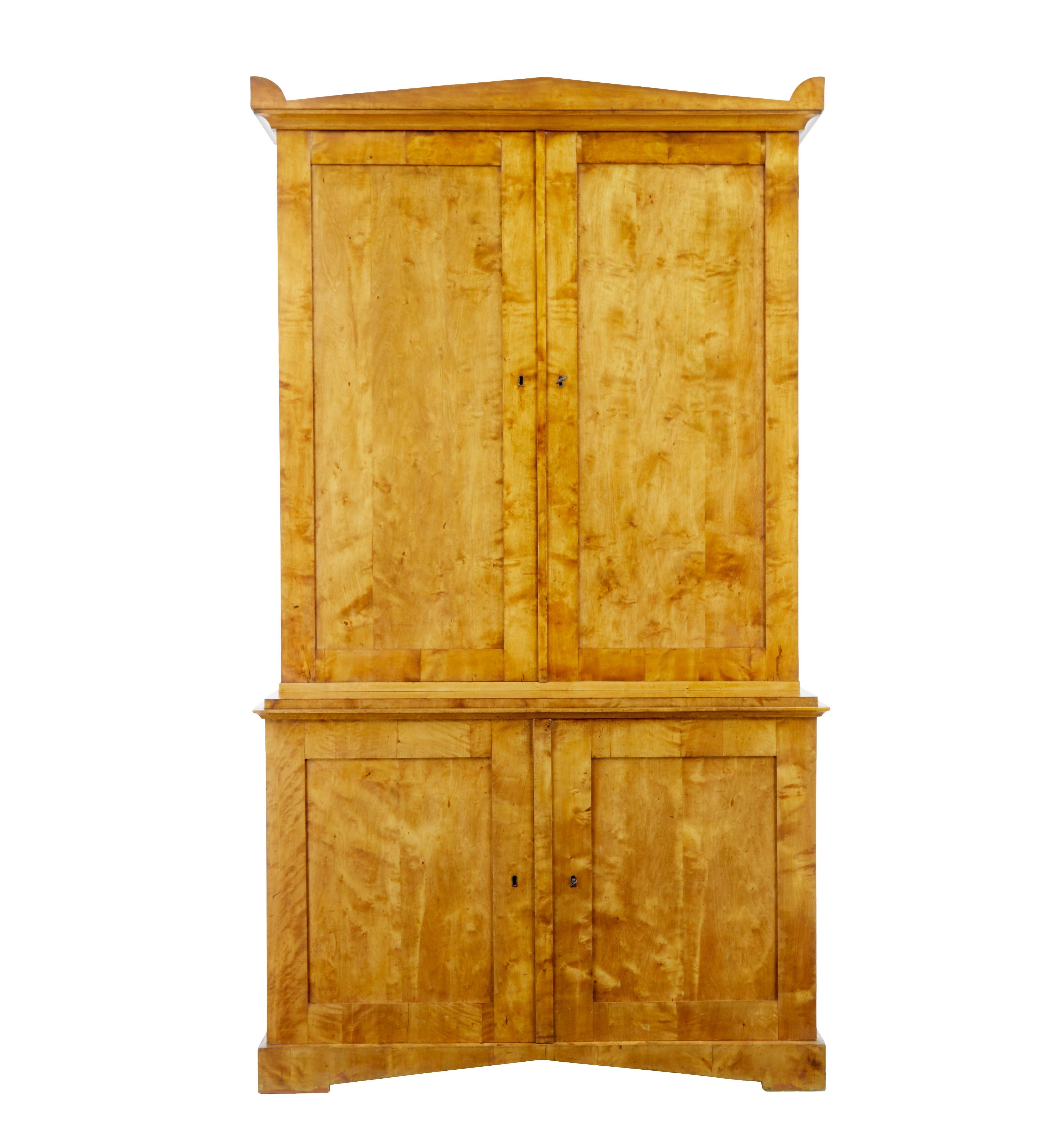 Fine quality Swedish 19th century birch cabinet circa 1870.

Good quality architectural birch cabinet from the mid-19th century. Cabinet comprises of 2 parts with rich quarter sawn veneers used. Shaped cornice with a double door cabinet below which