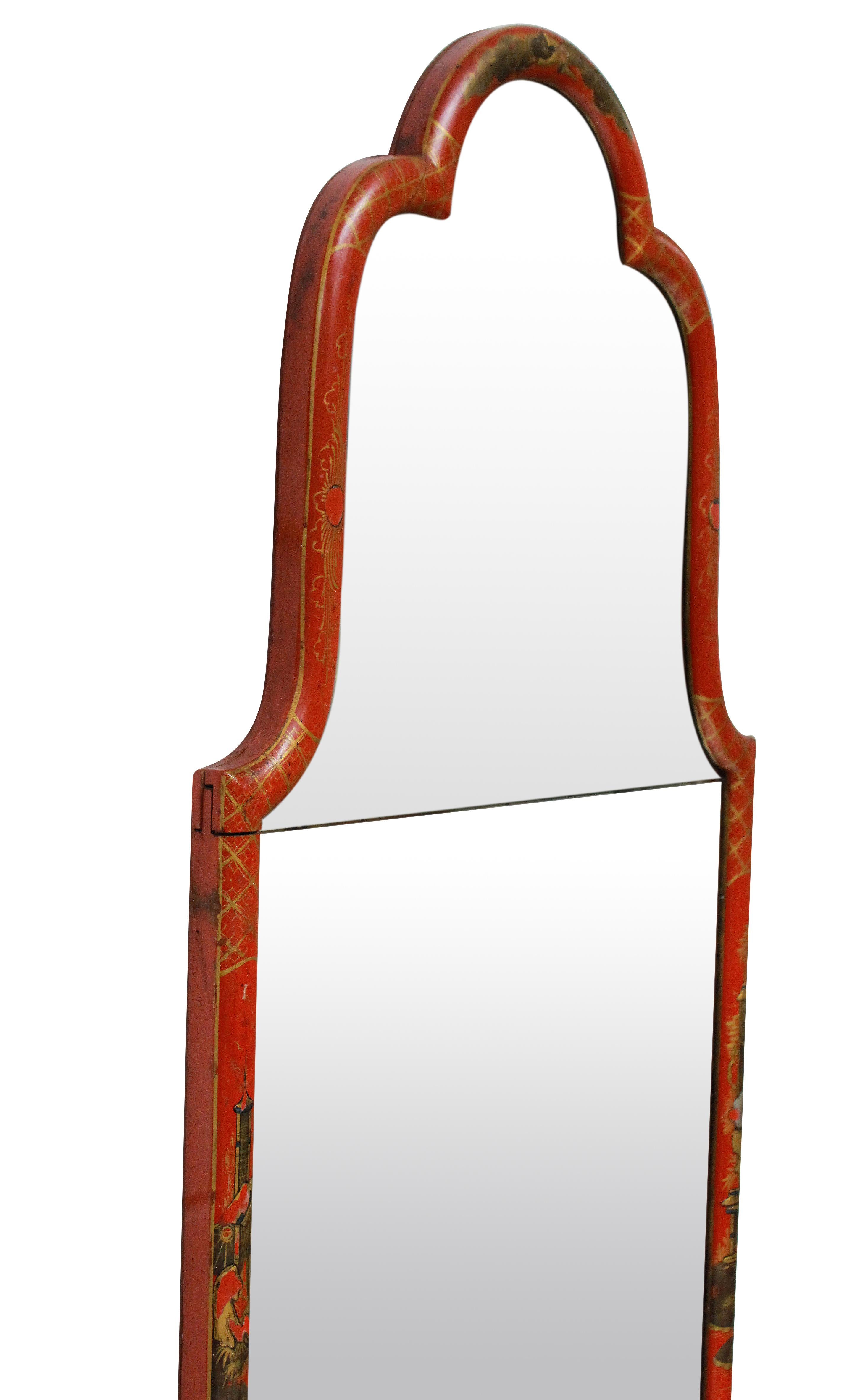 A fine English Queen Anne style Japanned mirror, in red lacquer, with its original beveled split mirror plate.

 