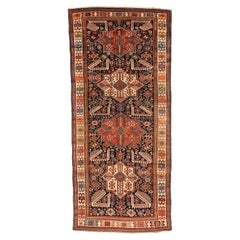 Fine et rare tapis caucasien bleu Shirvan Akstafa avec étoiles octogonales