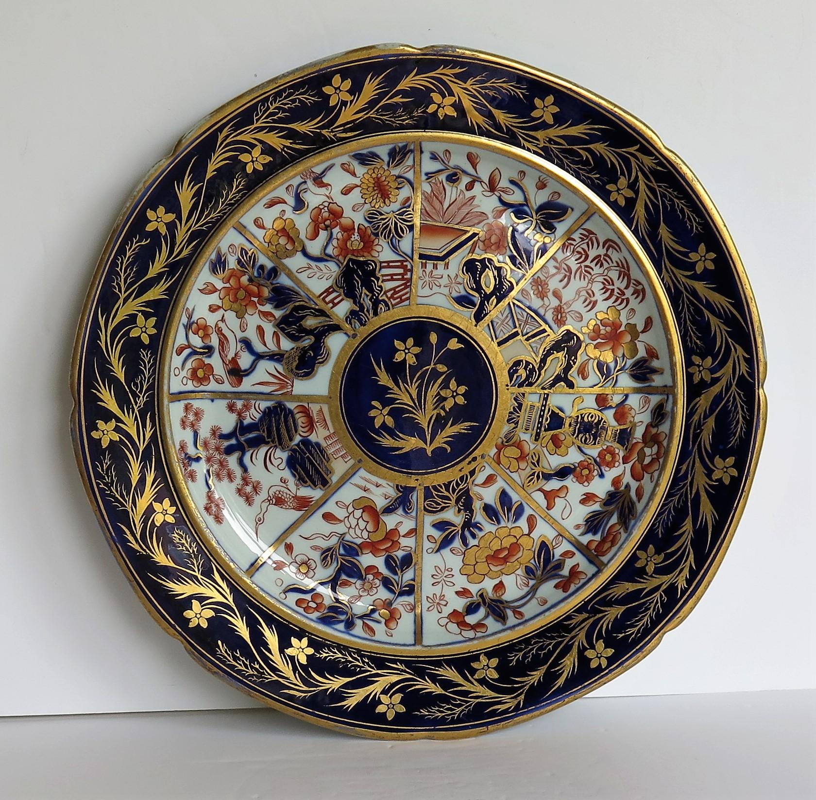 This is a very fine and rare dinner plate made by the Mason's factory at Lane Delph, Staffordshire, England, beautifully hand decorated in the Radial Japan Mazarine Pattern, fully stamped and dating to the earliest period of Mason's Ironstone