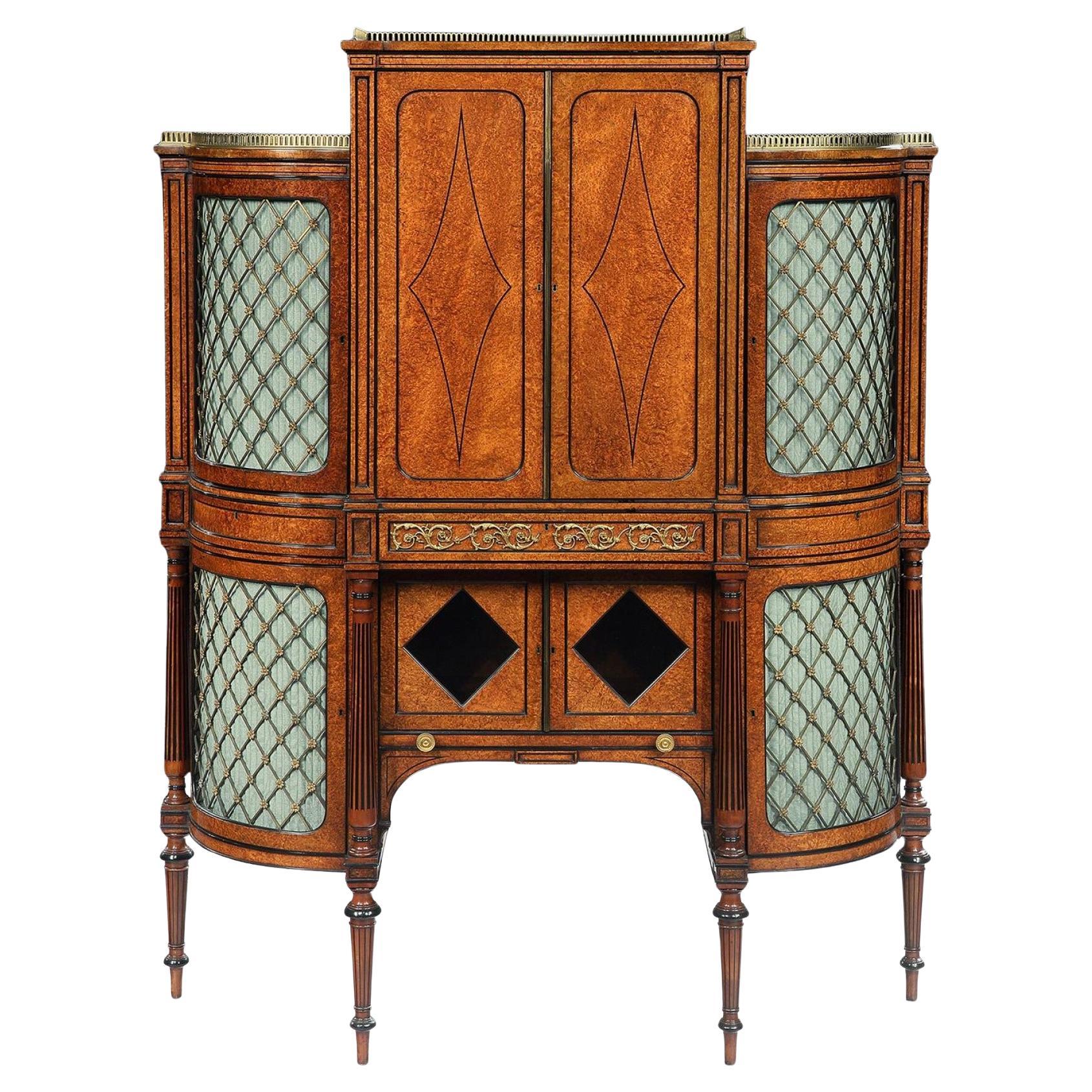 Regency Amboyna And Ebony Inlaid Gilt Bronze Mounted Shaped Cabinet For Sale