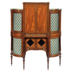 Regency Amboyna And Ebony Inlaid Gilt Bronze Mounted Shaped Cabinet