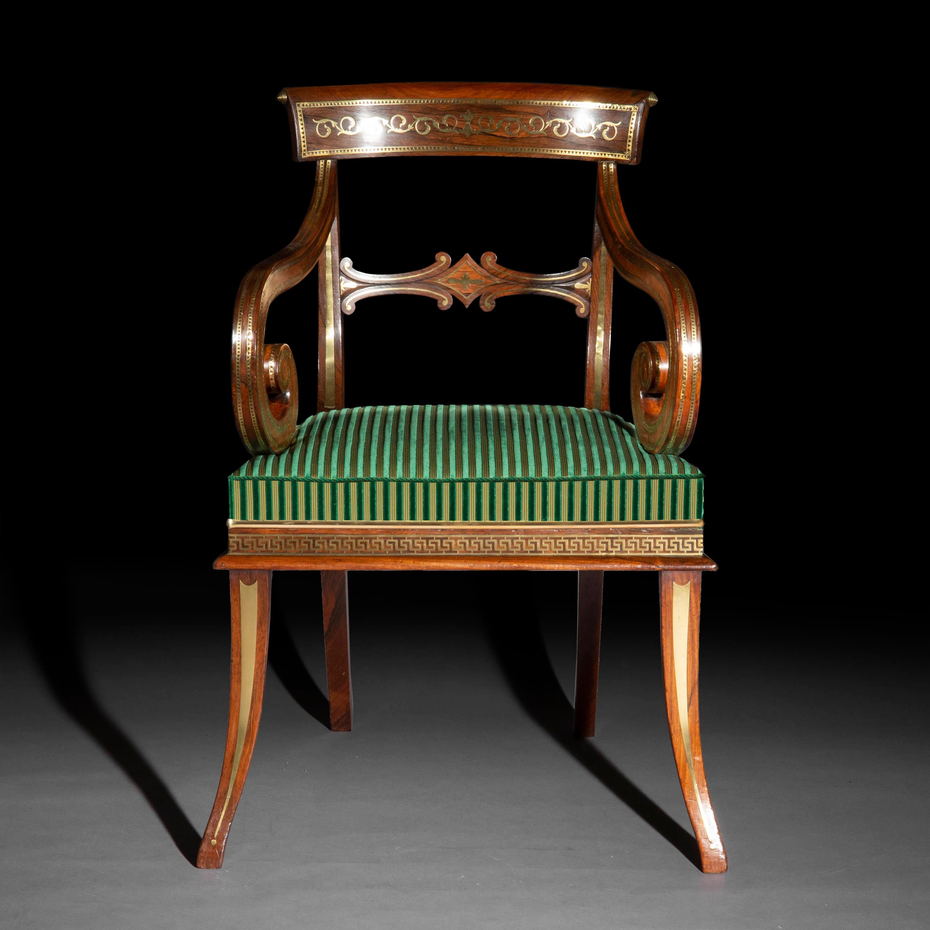 An exceptional early 19th century Regency period open armchair, of well-shaped Klismos outline and rare generous proportions, attributed to George Oakley,
England, circa 1810.

Why we like it
Its exquisite inlaid brass decoration together with
