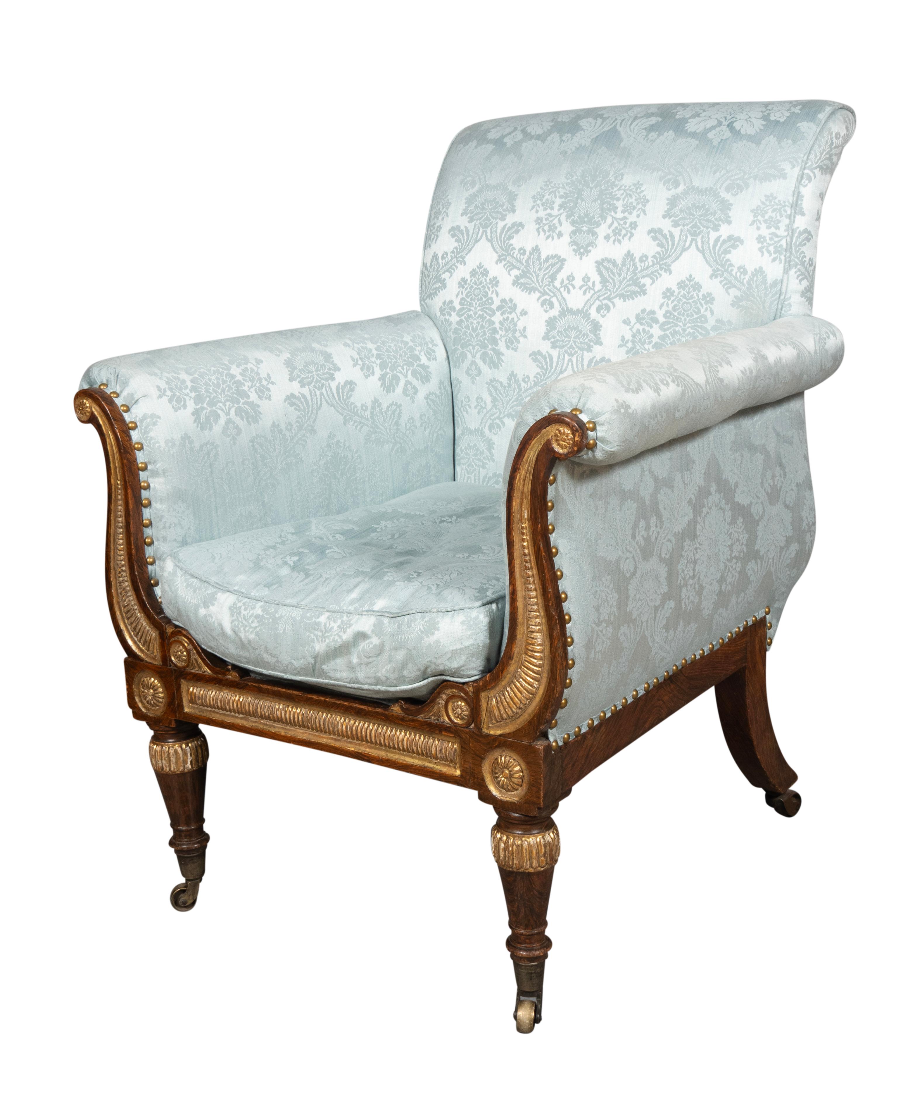 Début du XIXe siècle Fauteuil de style Régence en faux palissandre et doré au parchemin en vente