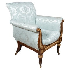 Fauteuil de style Régence en faux palissandre et doré au parchemin