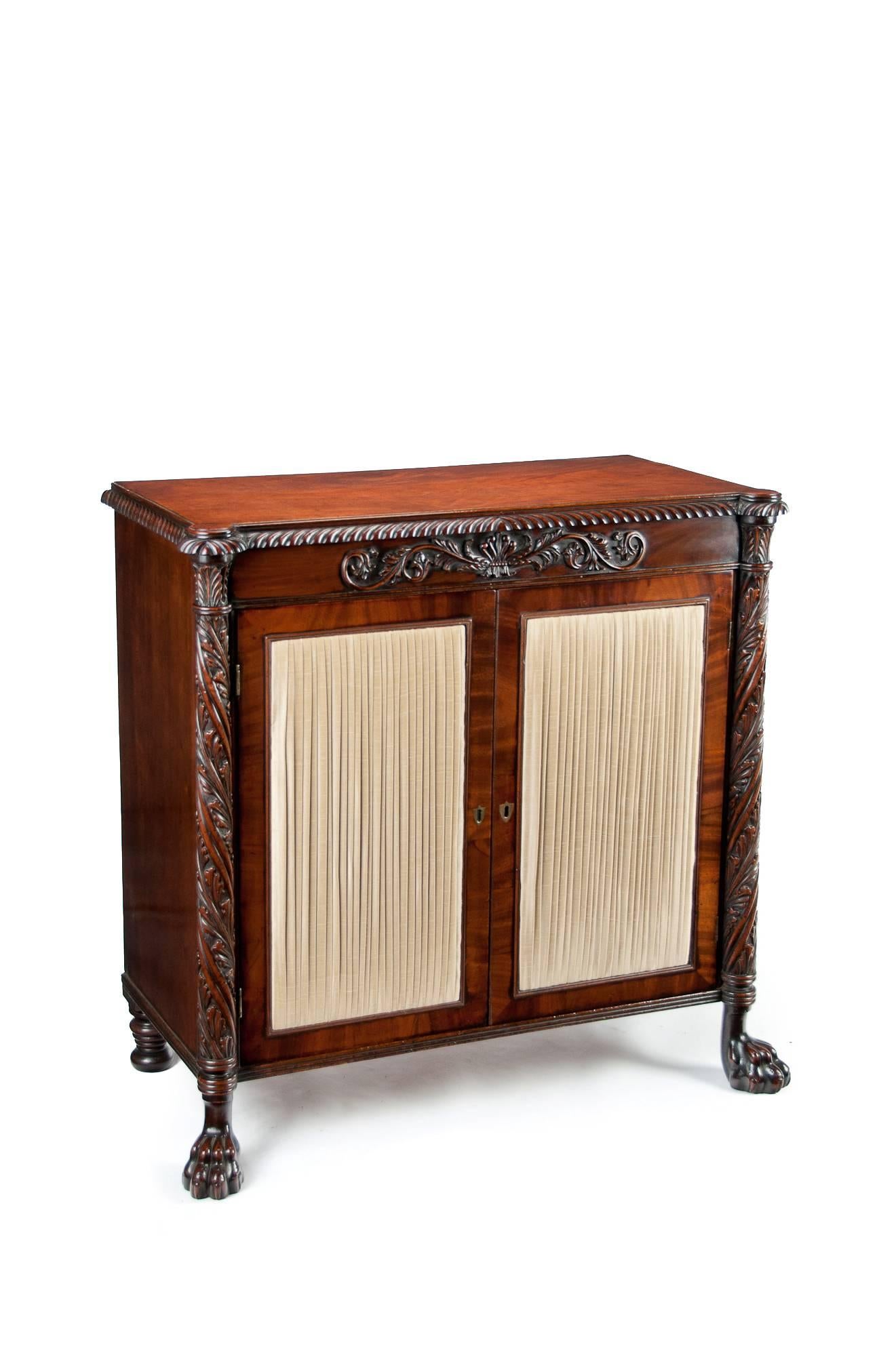 A very fine and rare Regency period Irish two door mahogany side cabinet / chiffonier dating to circa 1810.

This very elegant cabinet has been designed in the manner of George Smith and Thomas Hope having Egyptian influences. 

The solid