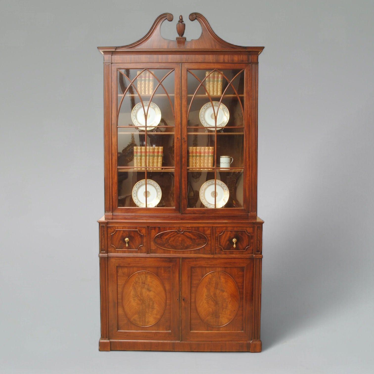 A super quality flame mahogany secretaire library bookcase with swanneck pediment and lancet glazing.
The secretaire drawer with a fitted removable writing slope and is stamped with the makers name.
Fabulous colour and patina.
Walker was a cabinet