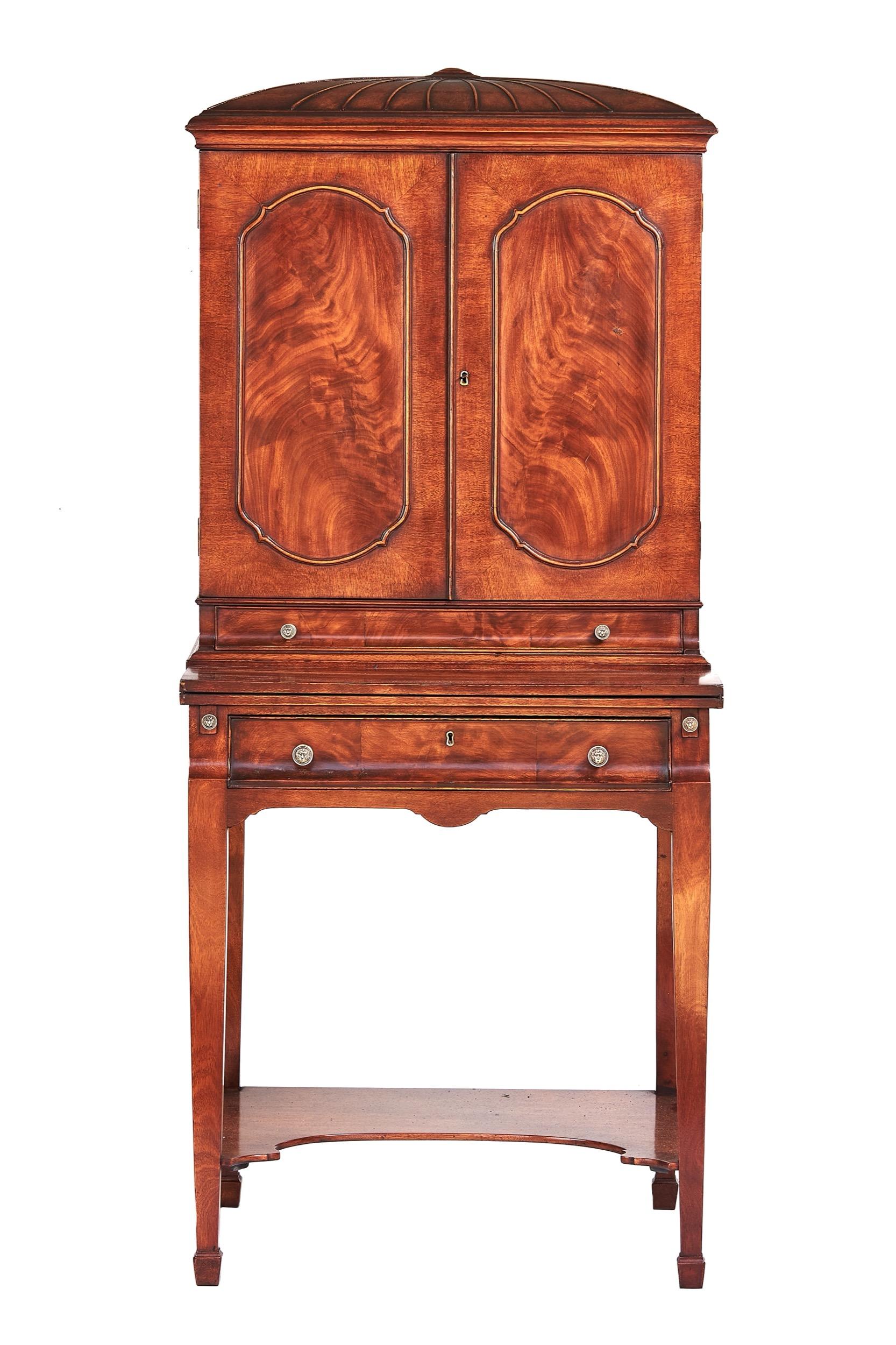 Fine Regency Style  Mahogany Writing Cabinet circa 1900
Semi dome shaped top with mould detail. 
Top Section :
Pair Flamed Mahogany doors, with oval framed panels, 
Working Lock & Key, open to Reveal:
Shelf, open pigeon holes, Centre door