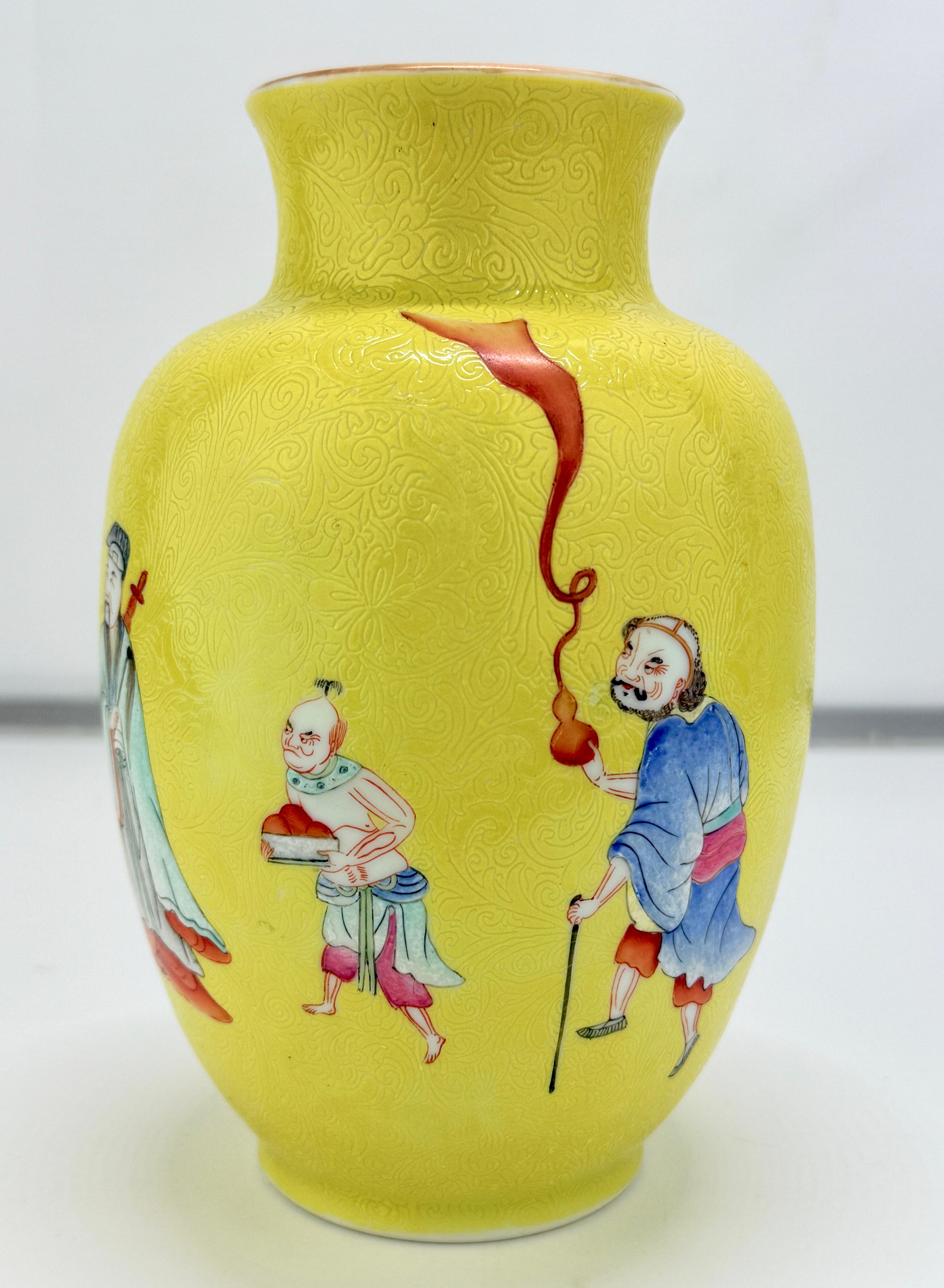 This finely enameled Chinese porcelain vase, likely dating to the Republic period (early to mid-20th century), exhibits a strong revivalist aesthetic referencing the Qianlong court style. The baluster-form vessel is decorated against a lemon-yellow