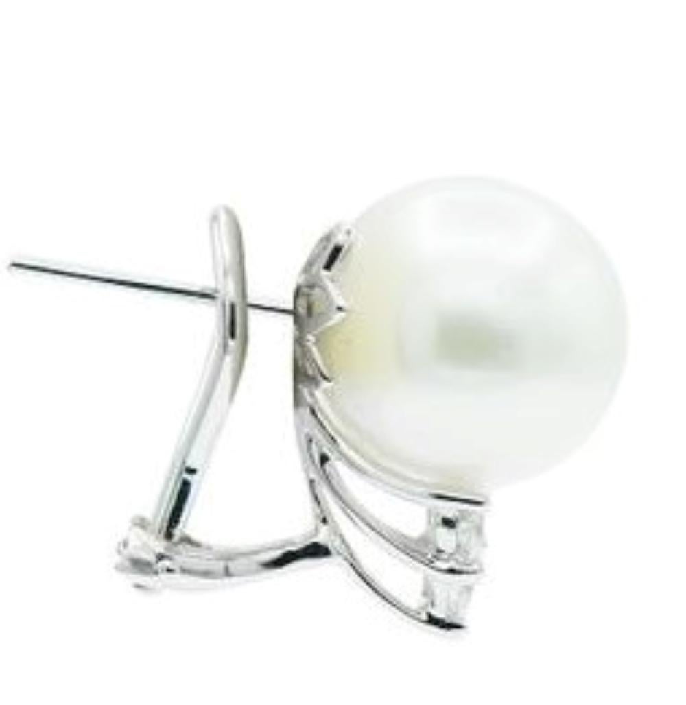 Modern Fine, Round South Sea Pearl Stud Earrings Accented with .60ct of Round Diamonds For Sale