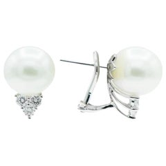 Fine, Round South Sea Pearl Stud Earrings Accented with .60ct of Round Diamonds