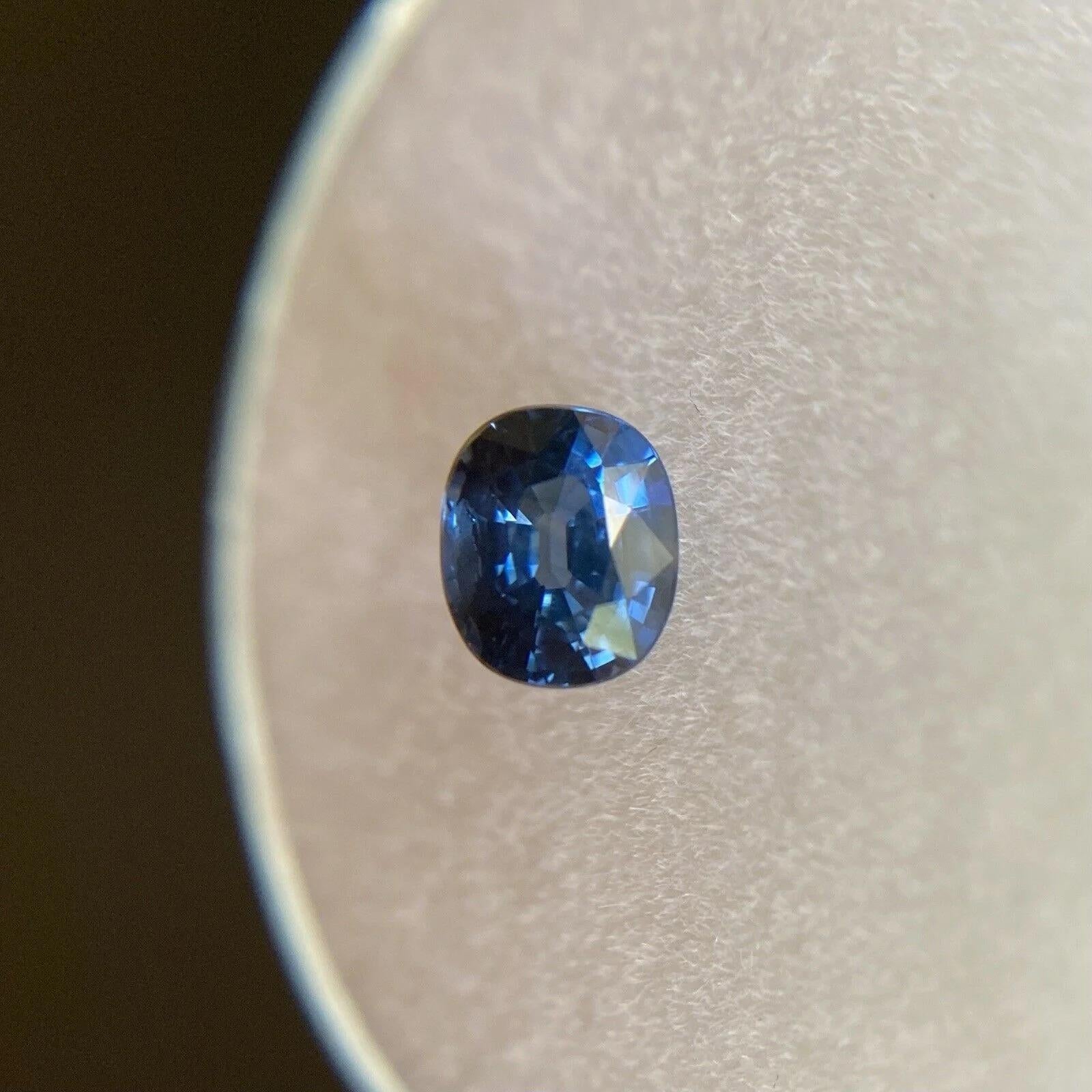 Fine Royal Blue Sapphire 0.68ct Cushion Cut Loose Rare Gem 5.2x4.3mm

Fine Royal Blue Australian Sapphire Gemstone.
0.68 Carat with a beautiful royal blue colour and very good clarity. Clean stone with only some small natural inclusions visible when