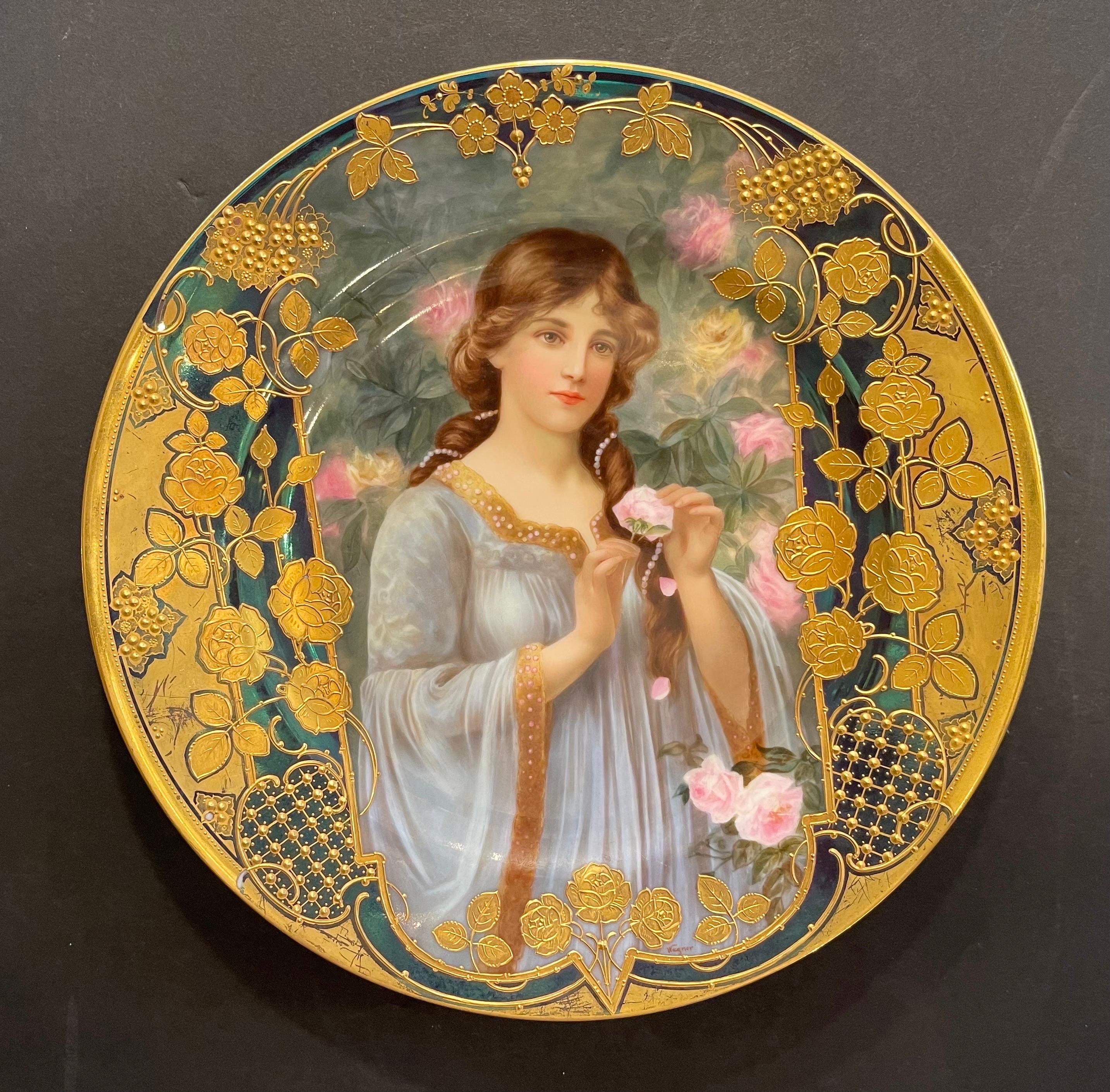 A Wonderful Royal Vienna hand painted raised gold porcelain portrait plate 
Signed on the back Unter Rosen with a Bee Hive and Germany 85867 UBS & what we think reads DOZ