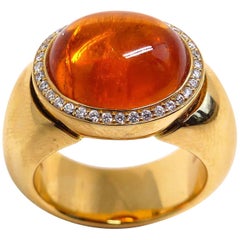 Ring in Rose Gold with 1 Mandarine Garnet Cabouchon and Diamonds