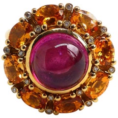 Ring in Rose Gold with 1 Rubelite Cabouchon and Mandarine Garnet and Diamonds