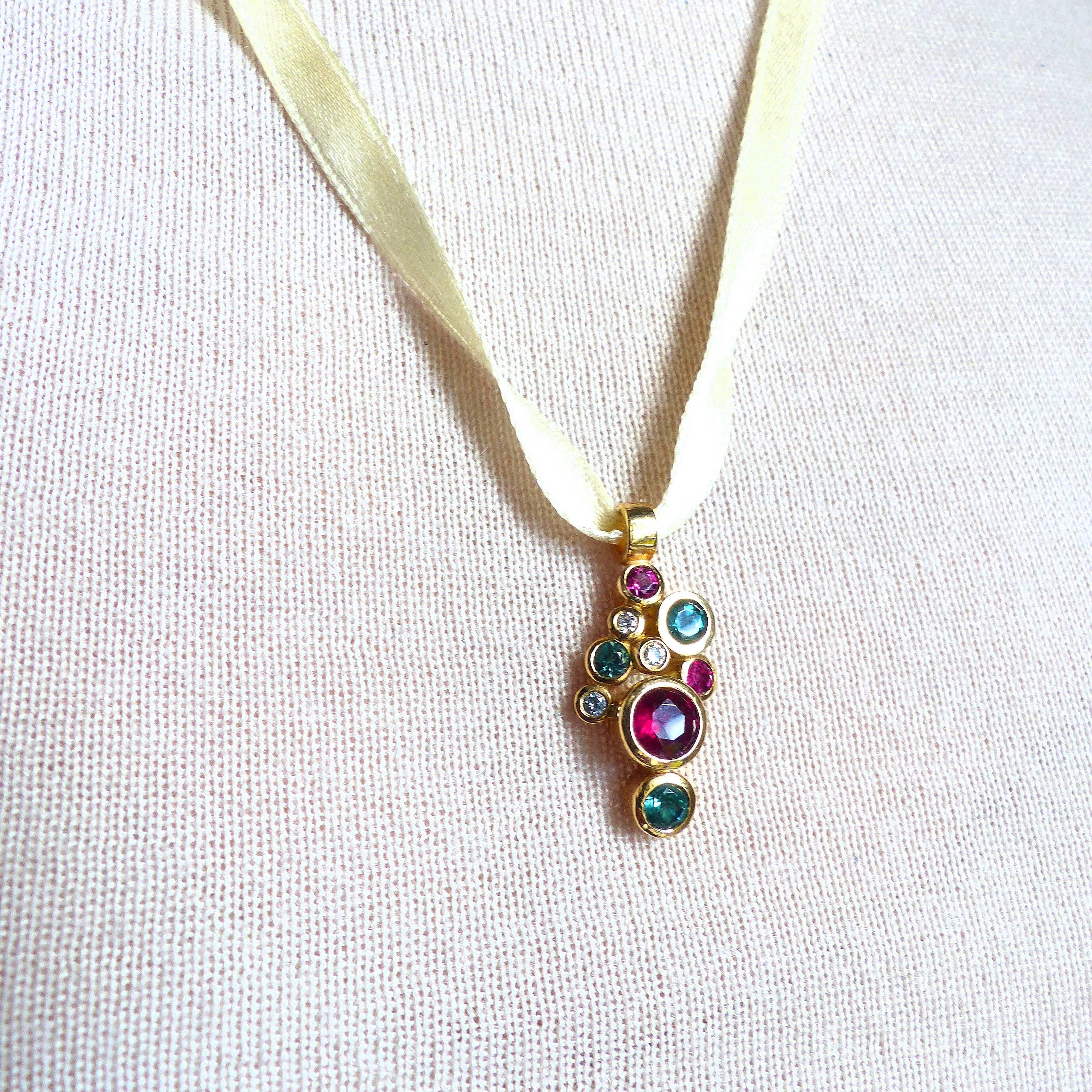 Contemporary Pendant in Rose Gold with green Tourmalines and Rubelites and Diamonds. For Sale