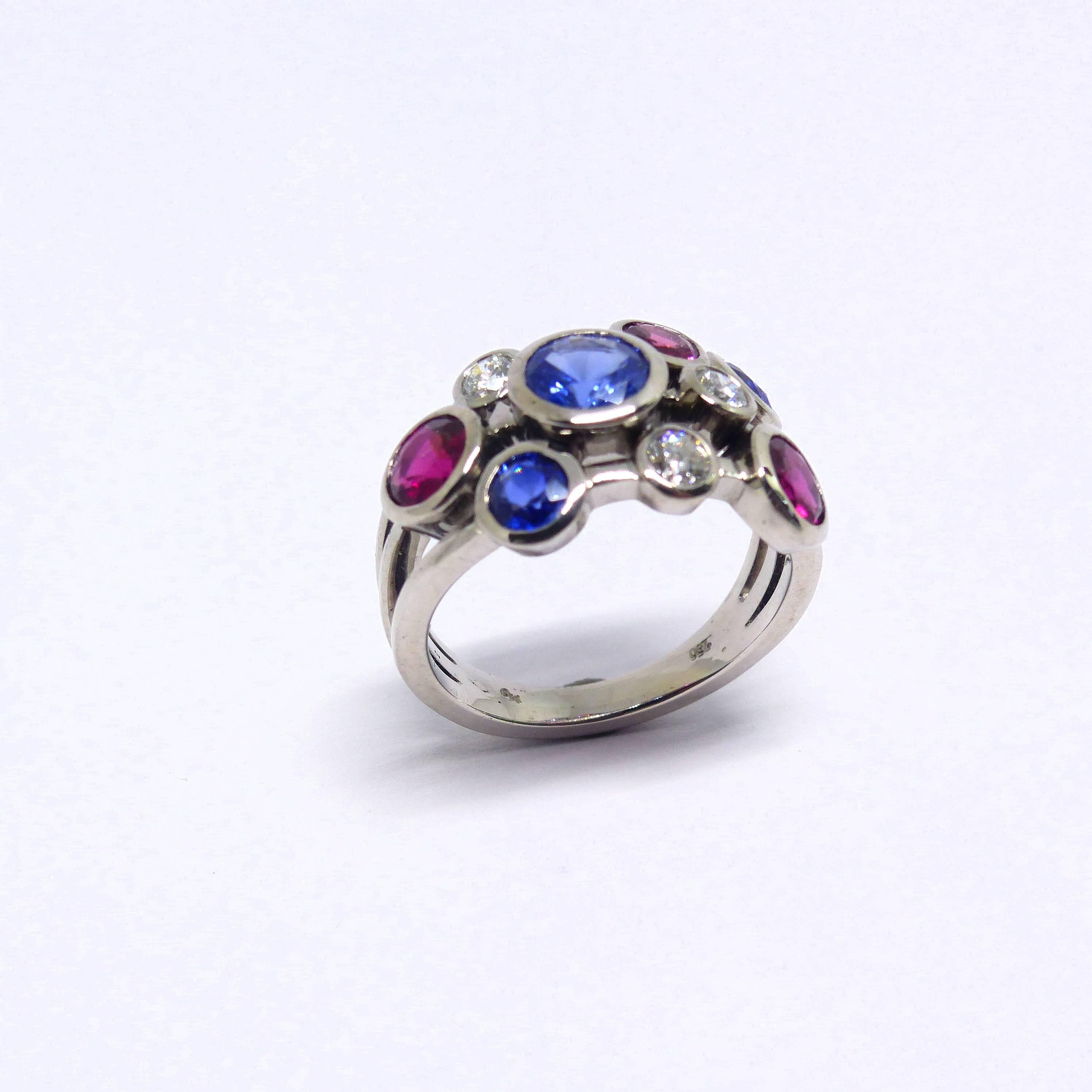 Thomas Leyser is renowned for his contemporary jewellery designs utilizing fine gemstones. 

This 18k white gold ring (8.44g) is set with 3x fine Sapphires (round, 4-6mm, 1.69ct) + 3x Rubelites (round 4-5mm, 1.15ct) + 3x Diamonds (brillant-cut, 3mm,