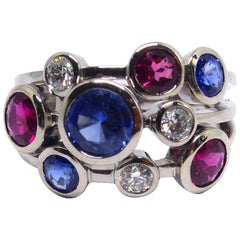 Ring in White Gold with Sapphires and Rubelites and Diamonds.