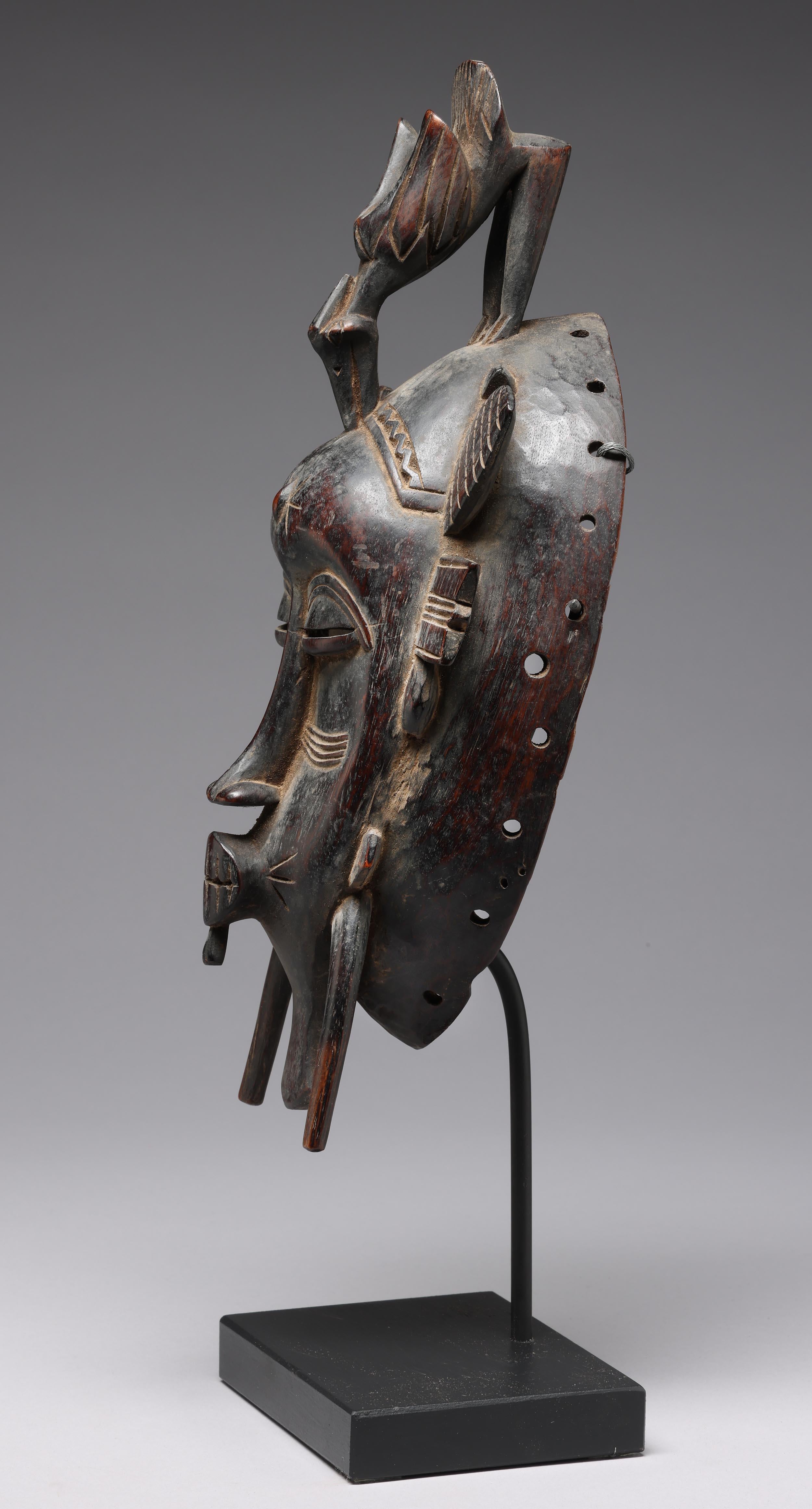Fine Senufo Kepelie Dance Mask with Bird Figure on Top, Early 20th ...