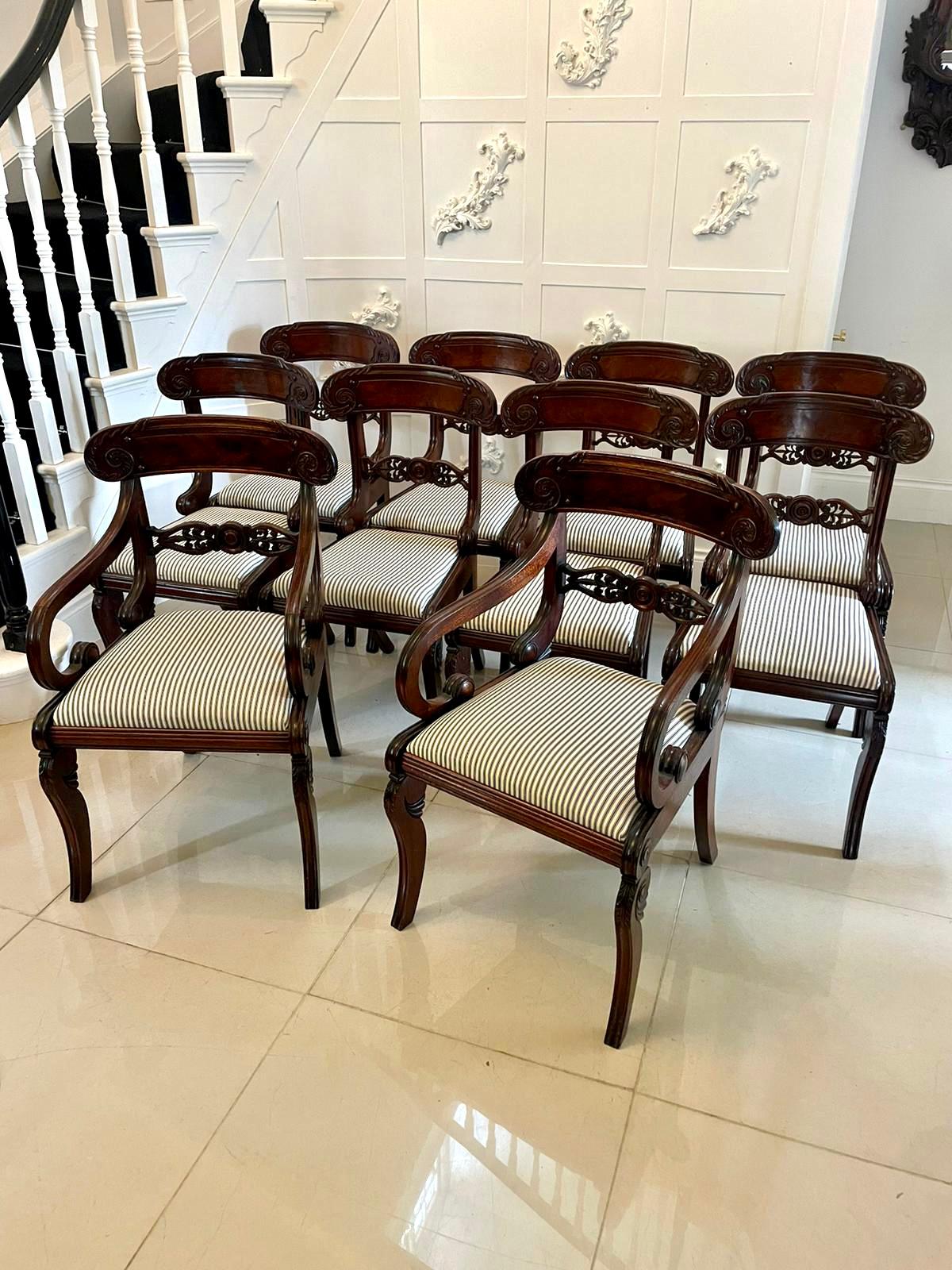 Fine set of 10 antique regency quality carved mahogany dining chairs consisting of 2 elbow chairs and 8 single chairs having a quality figured mahogany top rail with carved scrolls carved centre splat the elbow chairs having reeded scroll shape open
