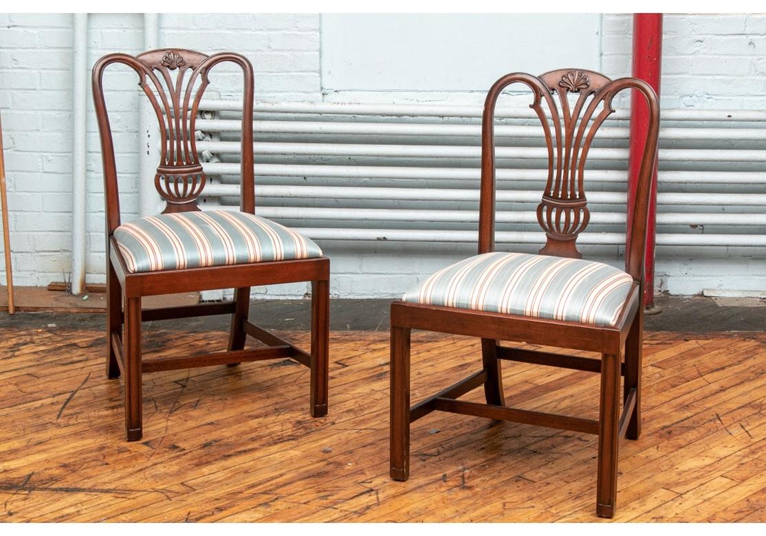 Very well made and fine quality set of ten side chairs with urn form open backs with shaped tops, straight front legs and cross-stretchers. The chairs are solid mahogany having good weight with corner blocking and hand-finished having a particularly