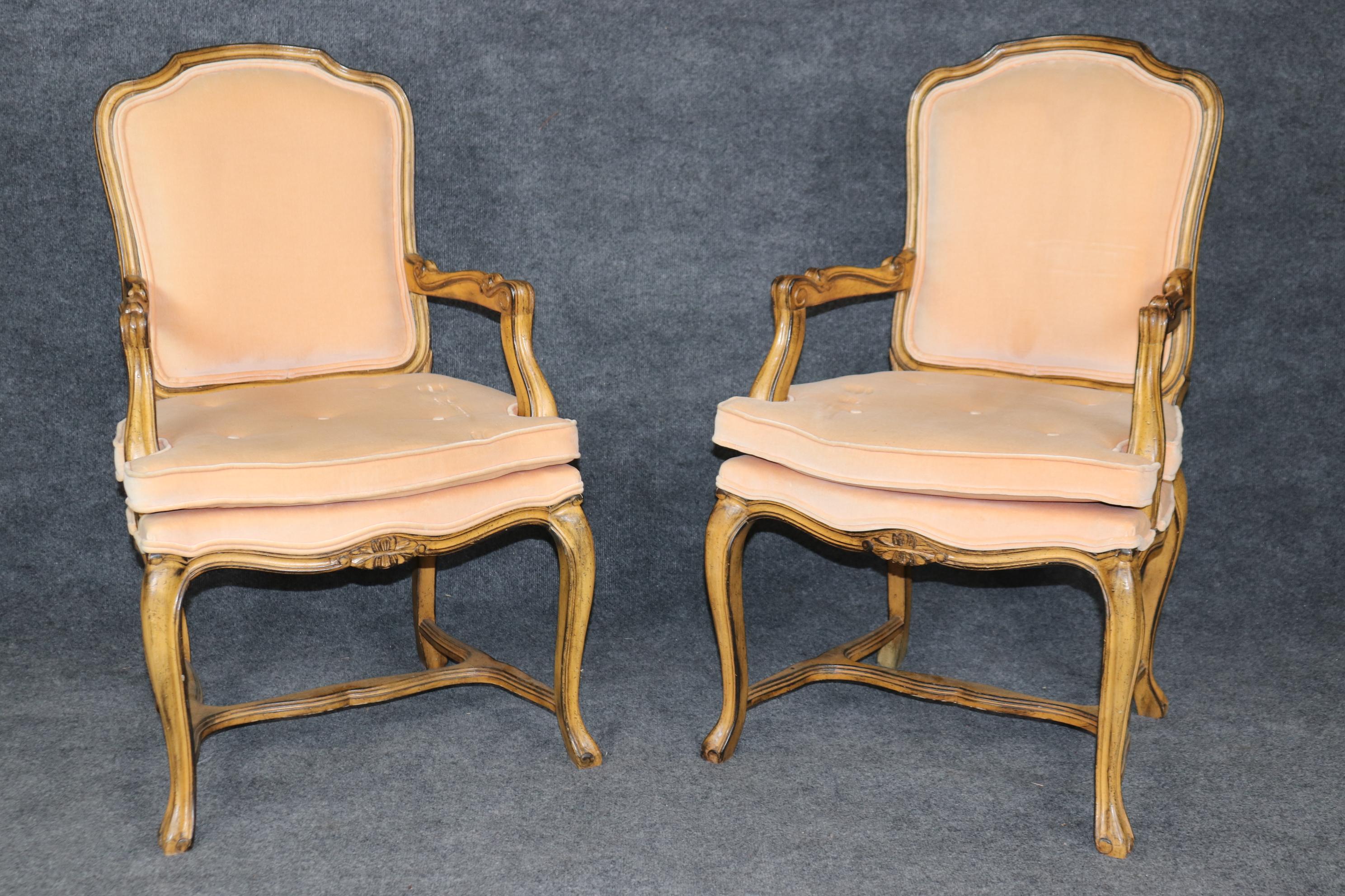 This is a fantastic set of 10 carved walnut Intentionally-distressed French Louis XV dining chairs. They are in their original upholstery so expect them to have stains as shown and will need to be reupholstered if you want them to be perfect. They