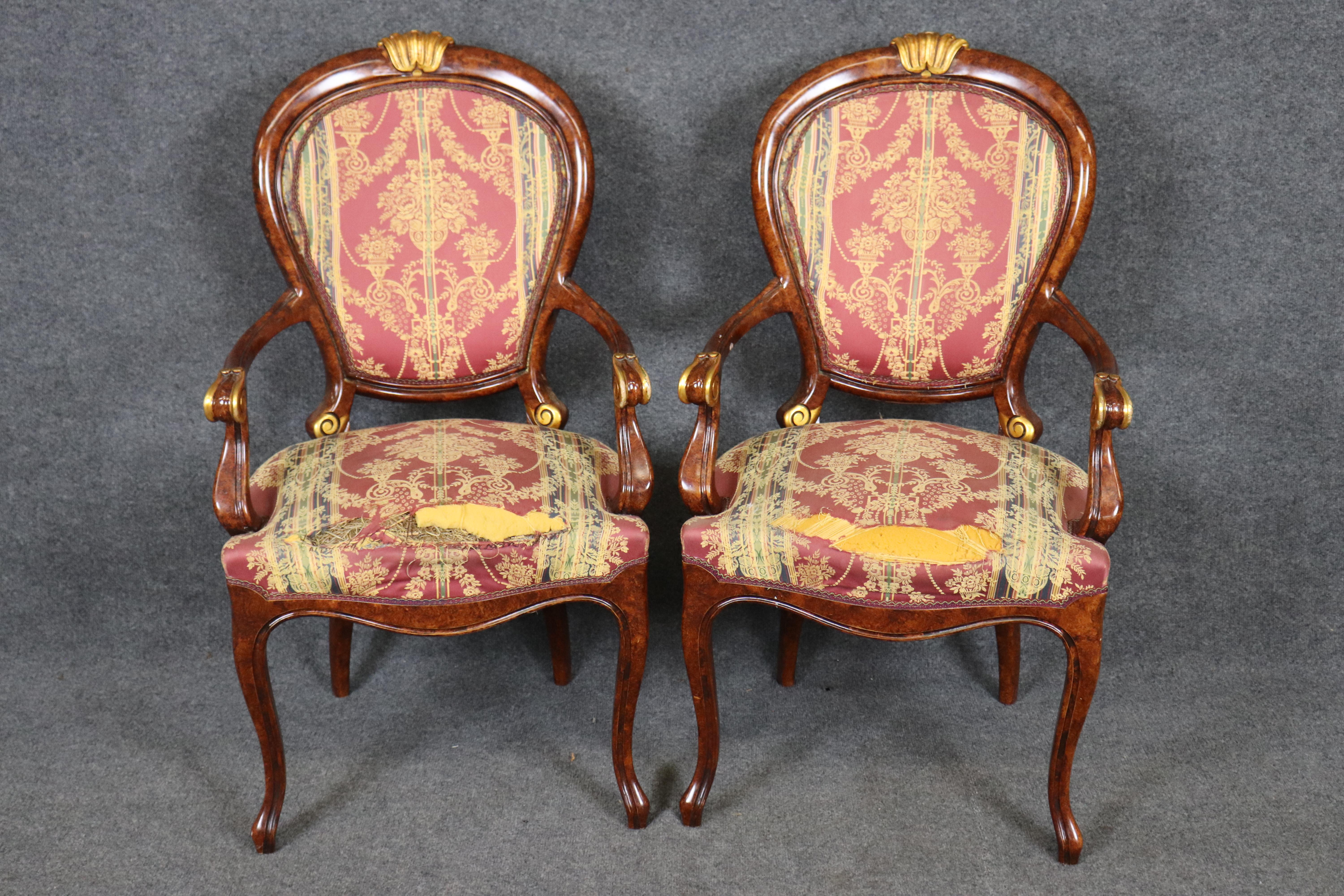 This fine set of eight French Louis XV style dining chairs showcases the timeless elegance of 18th-century Rococo design, crafted with beautifully shaped solid mahogany frames. The chairs feature graceful cabriole legs, serpentine seat rails, and