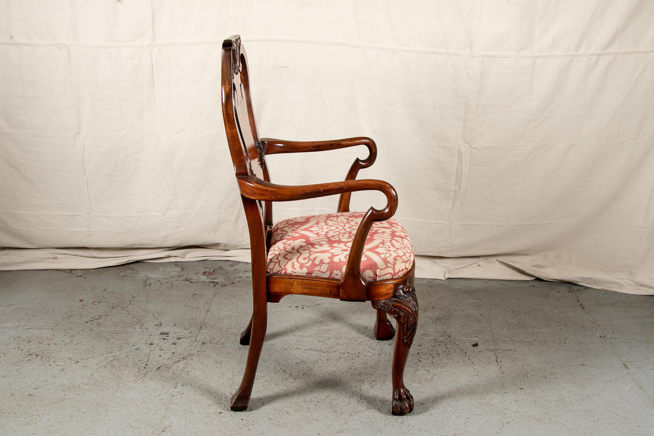 Fine set of 12 Georgian style carved burled wood dining chairs, large scale chairs, the crest rails with carved shell motifs over broad shaped splats with carved acanthus scrolls. The heavy cabriole front legs with carved leafy knees and hairy paw