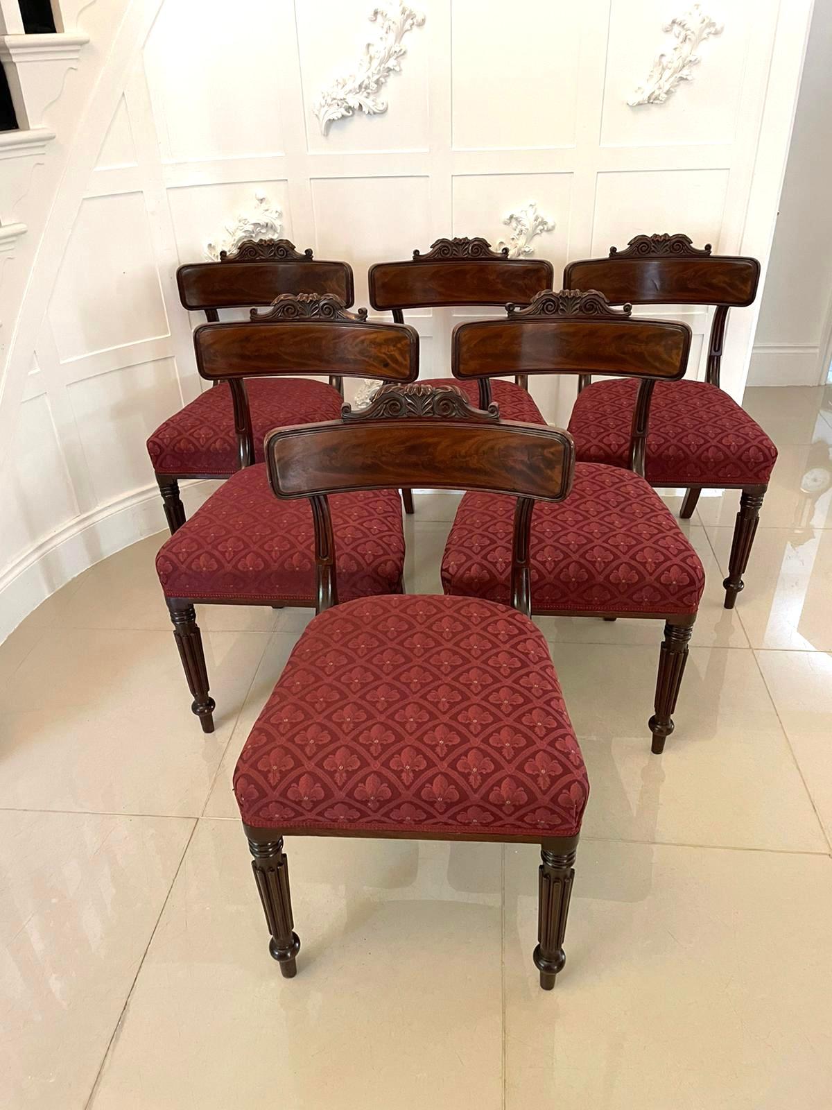 Fine set of 6 antique regency quality mahogany library chairs by the prestigious furniture maker Gillows of Lancaster and London having a quality figured mahogany top rail with a reeded edge and carved top supported by shaped reeded supports