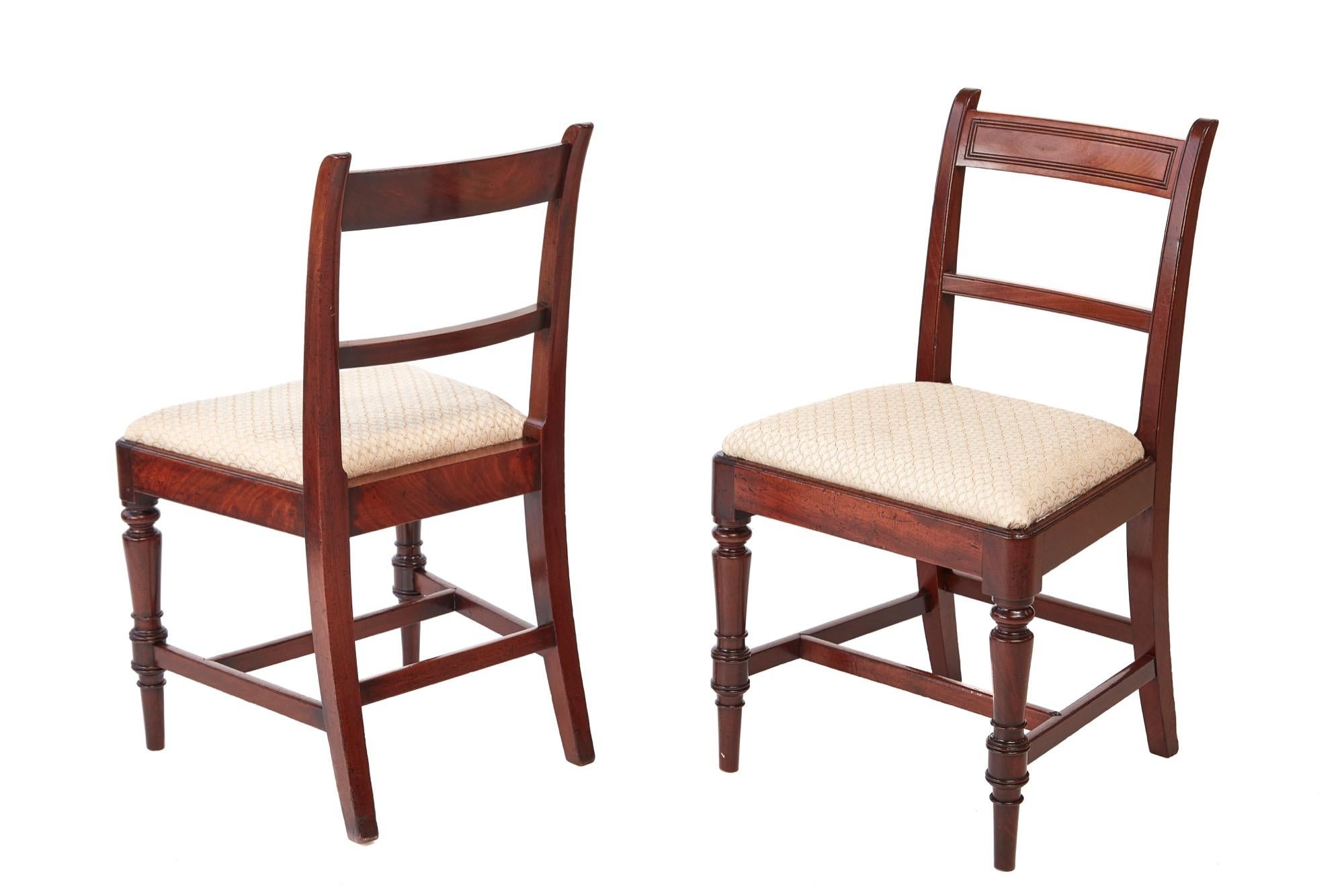 Fine quality set of 6 George III antique mahogany dining chairs. Five single and one carver. Elegant shaped top rail with a reeded panel and reeded centre rail. The carver has attractive shaped arms supported by shaped turned supports. They are all