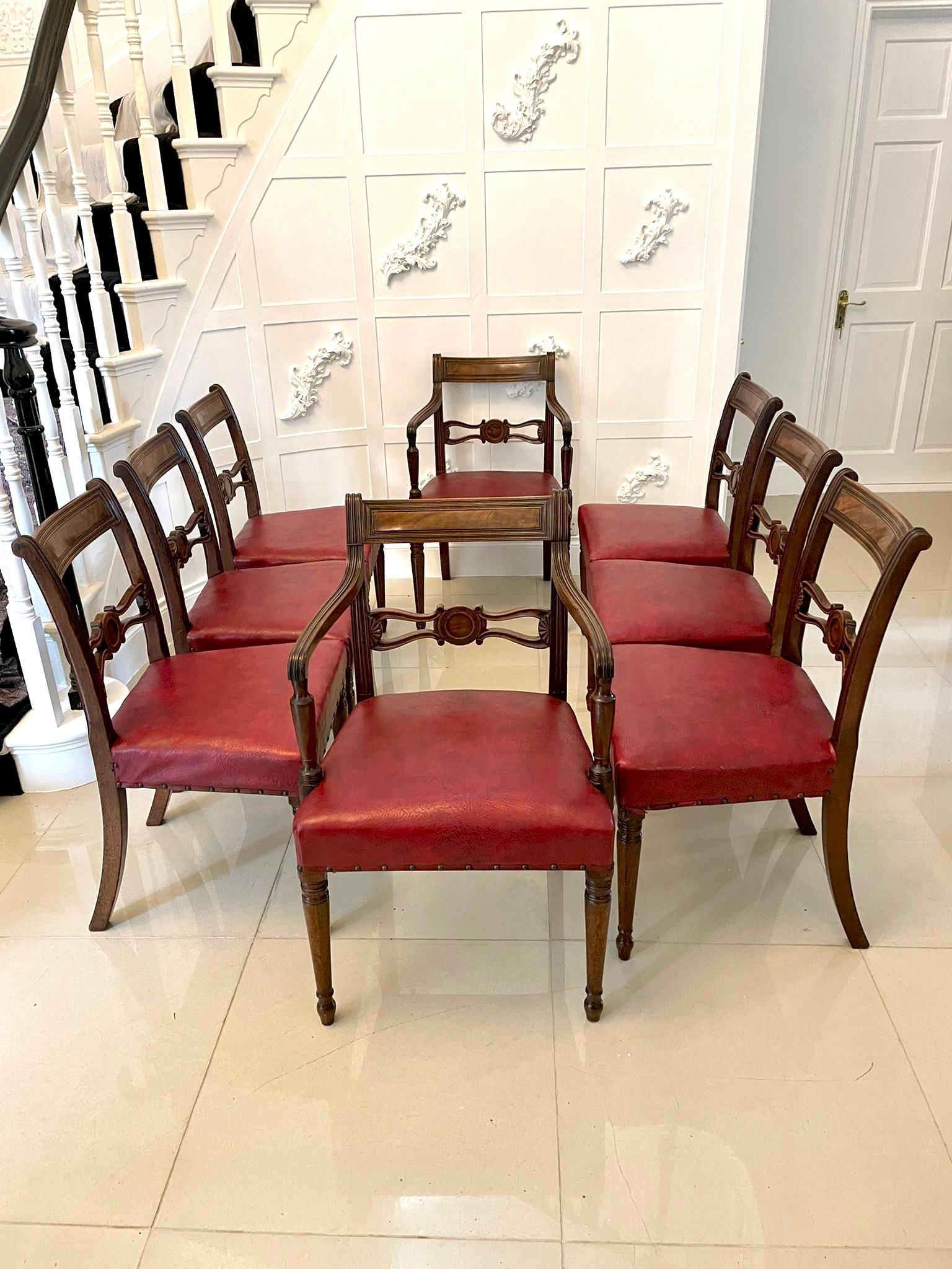 Fine set of eight antique George IIIl quality mahogany dining chairs consisting of two carver chairs and six single chairs in original condition having a quality reeded top rail and carved shaped mahogany splat to the centre. The pair of carver