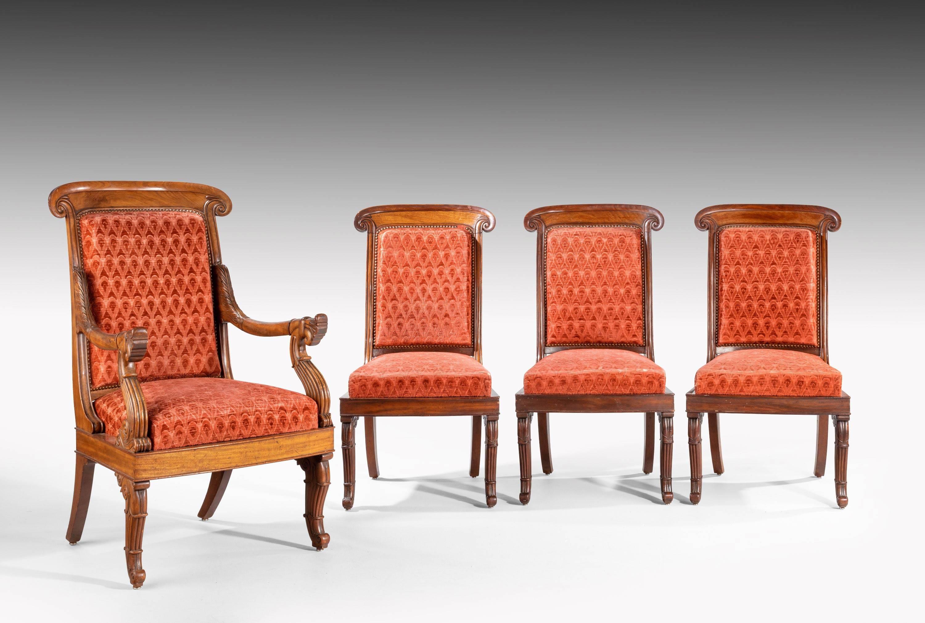 A very fine set of mahogany framed William IV chairs. Comprising six side chairs, and a pair of elbow chairs. The elbow chairs with elaborate scrolled arms and supports all of the supports of an unusual cabriole and banded design. 

Measure: Seat