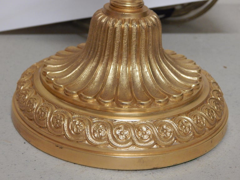 Cast Fine Set of Four Louis XVI Style Dore Bronze Candlestick Lamps For Sale