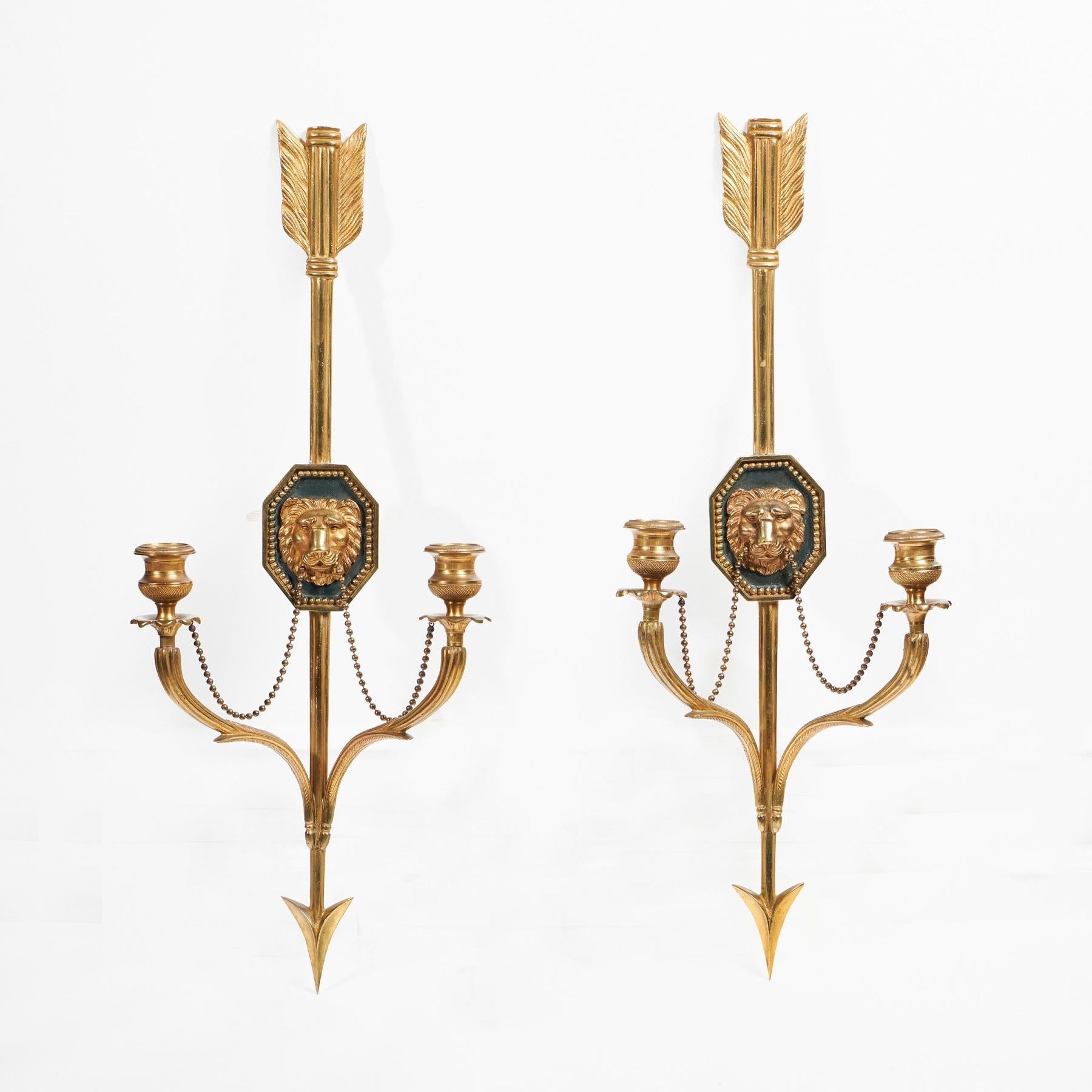 Fine Set of Four of Italian Ormolu Wall Lights or Appliques in the French Empire Style.



Italian - Circa 1880



These lovely wall lights are conceived as notched arrows with lion mask plaques in the centre of the shafts. The mouths of the lions,