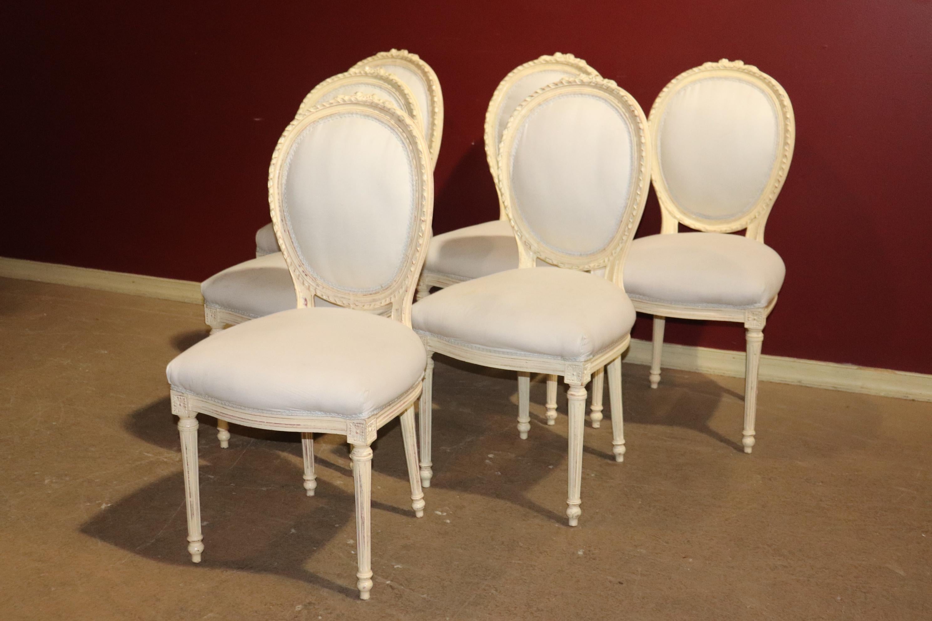 Mid-20th Century Fine Set of French Creme Painted Louis XVI Cameo Back Carved Dining Chairs