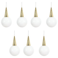 Fine Set of Seven Art Deco Opal Glass Pendants