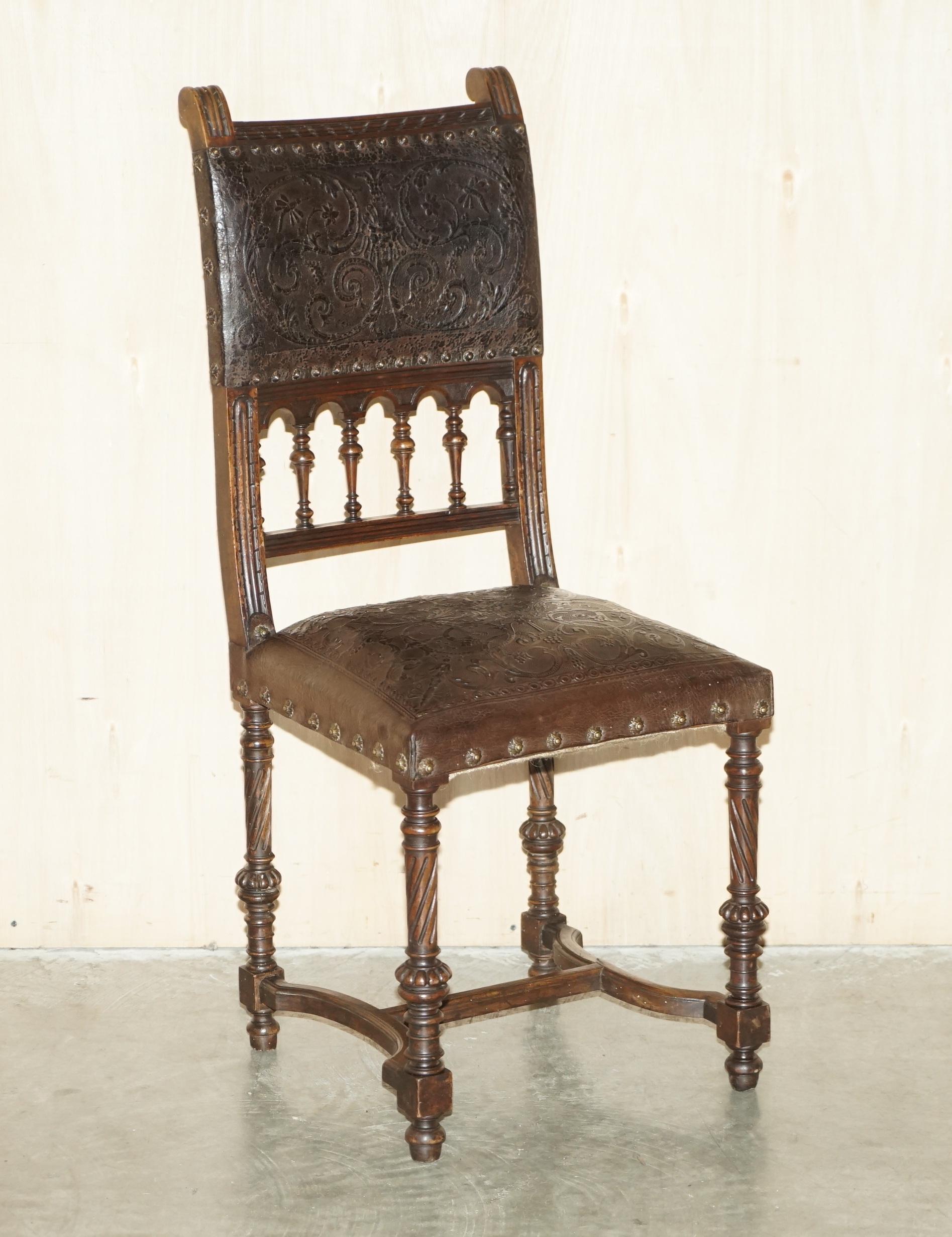 We are delighted to offer for sale this exceptional set of six French oak with Embossed pressed brown leather upholstered Henry II circa 1880 dining chairs

A very rare and totally original set of Victorian dining chairs. They have the original